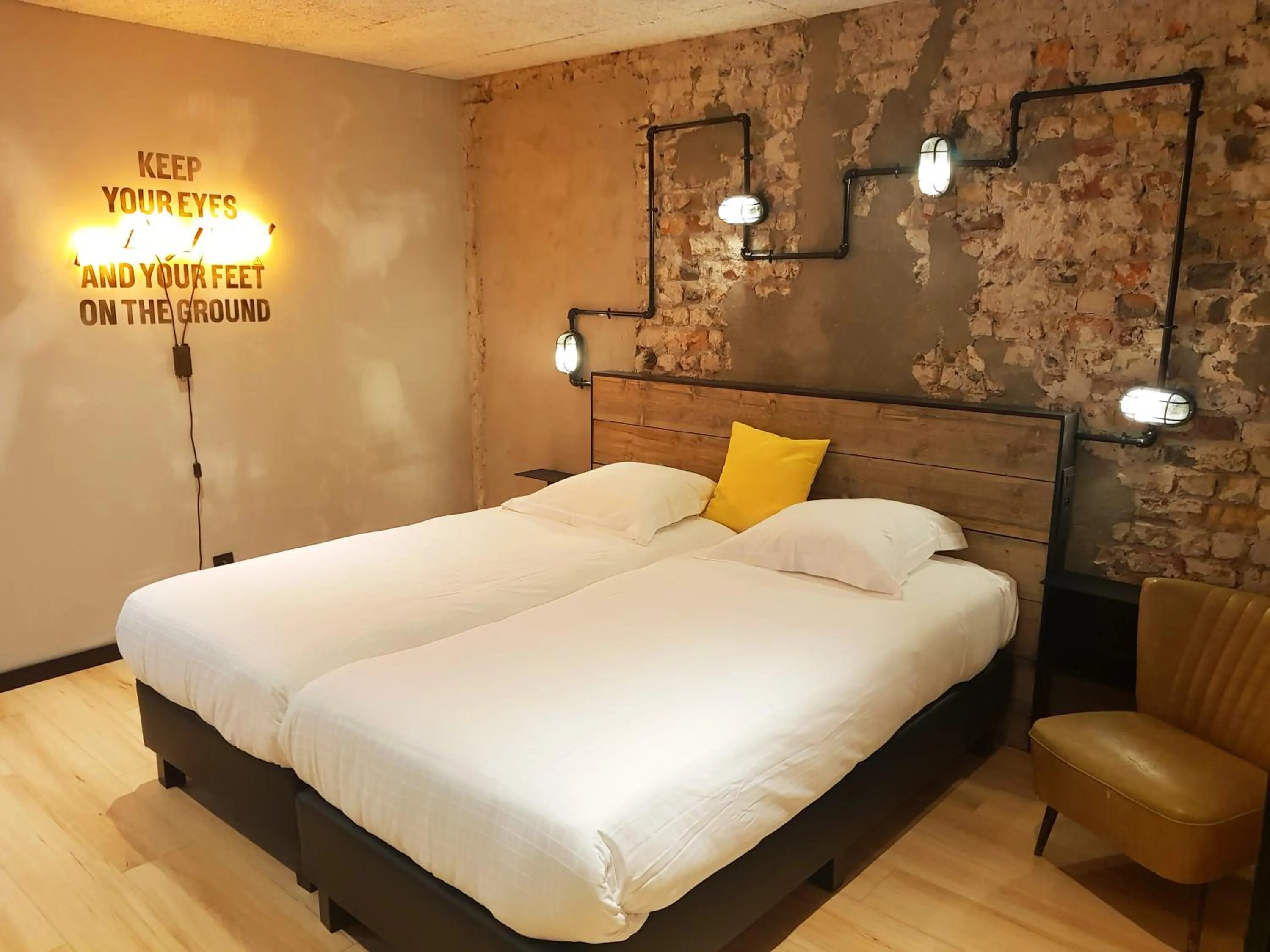 Bed in Upstairs Hotel