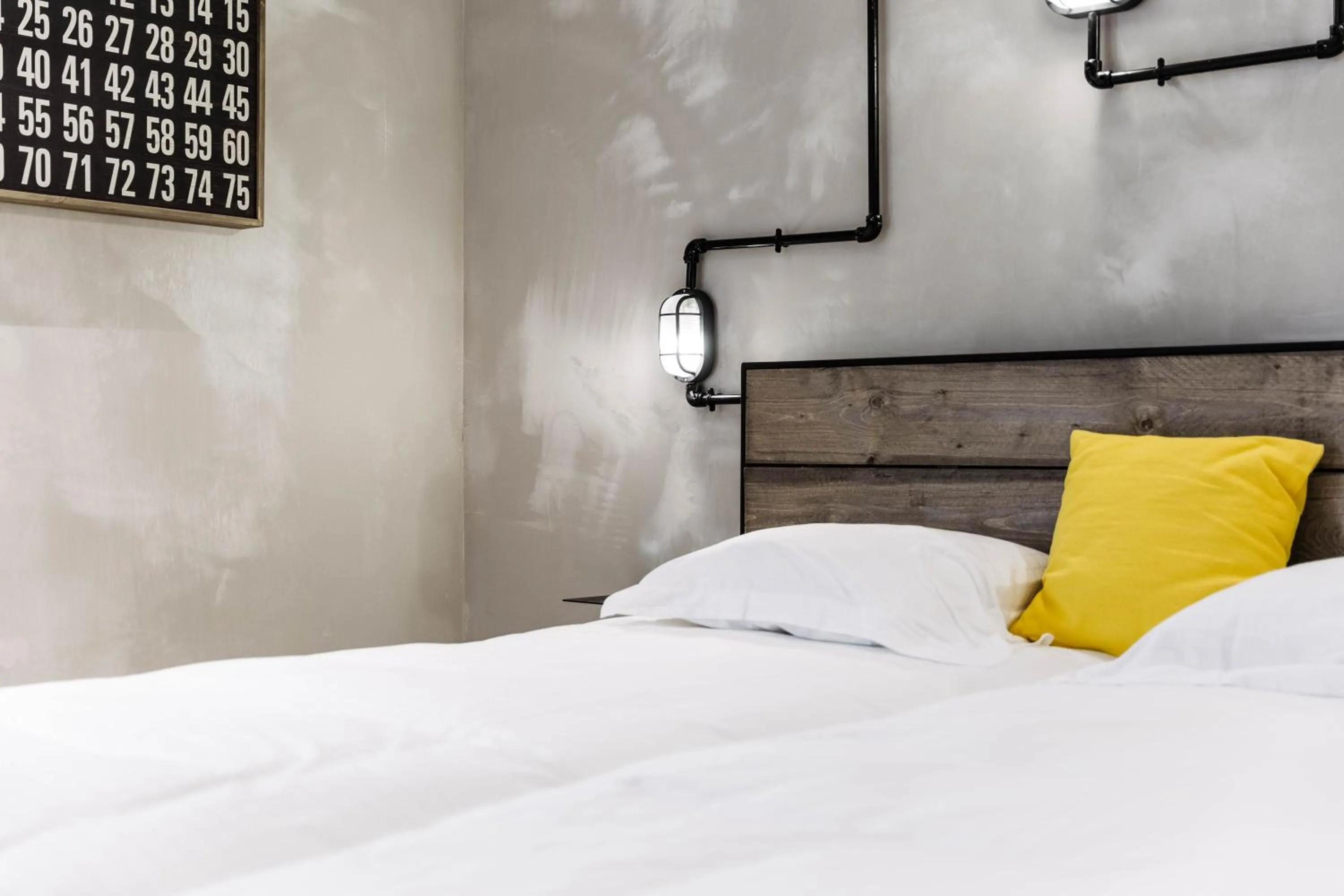 Bed in Upstairs Hotel