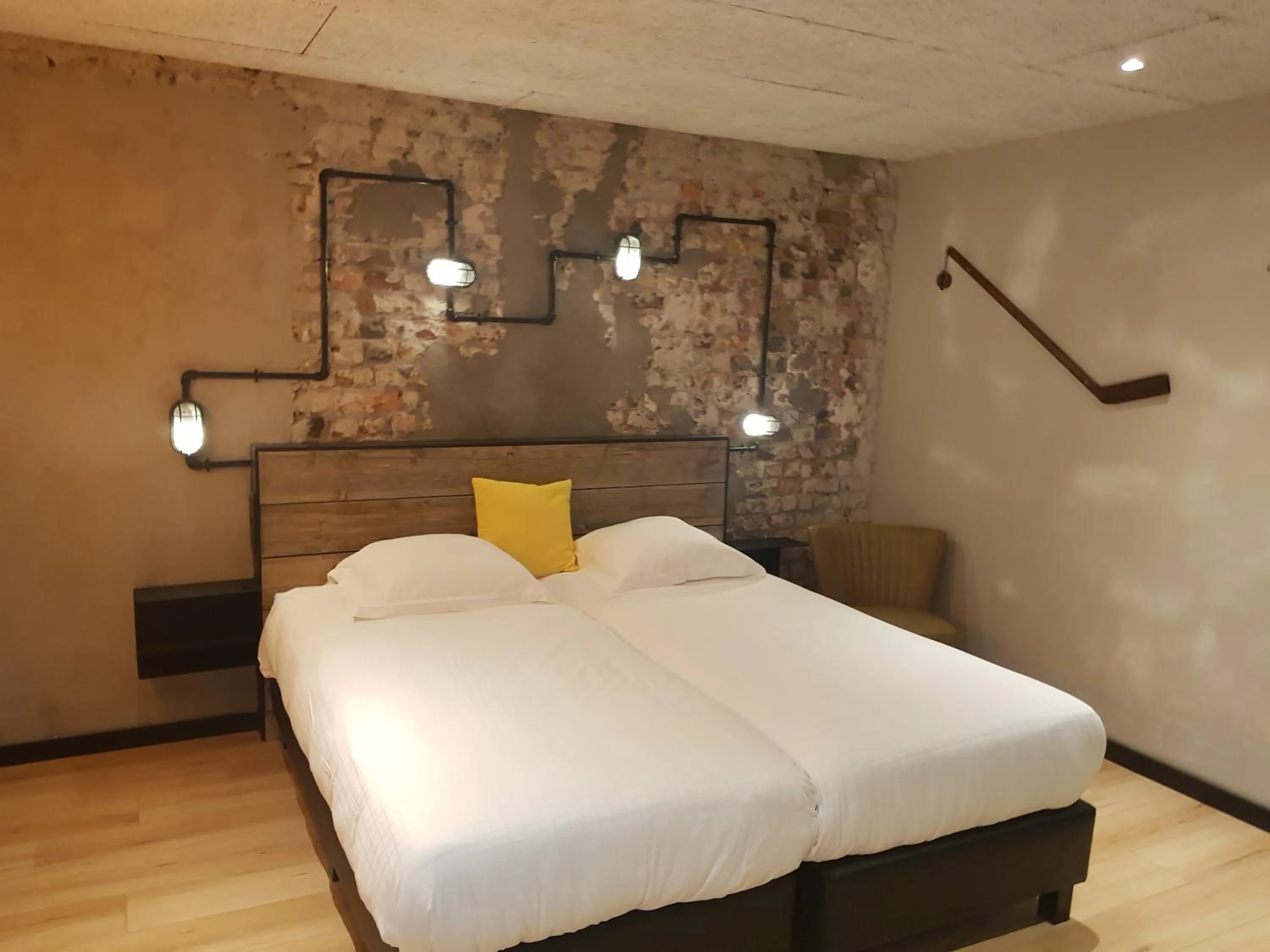 Bed in Upstairs Hotel