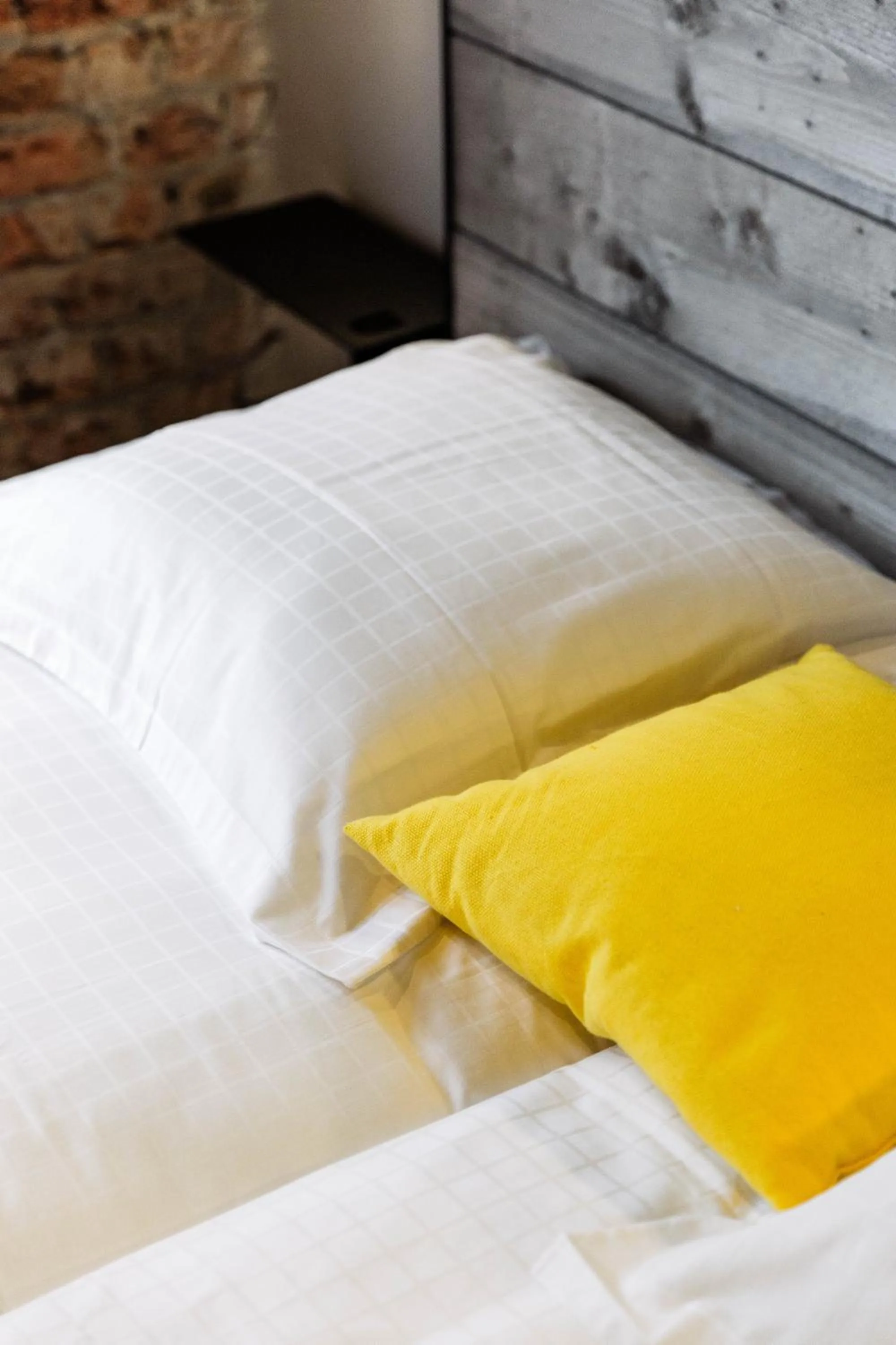 Bed in Upstairs Hotel