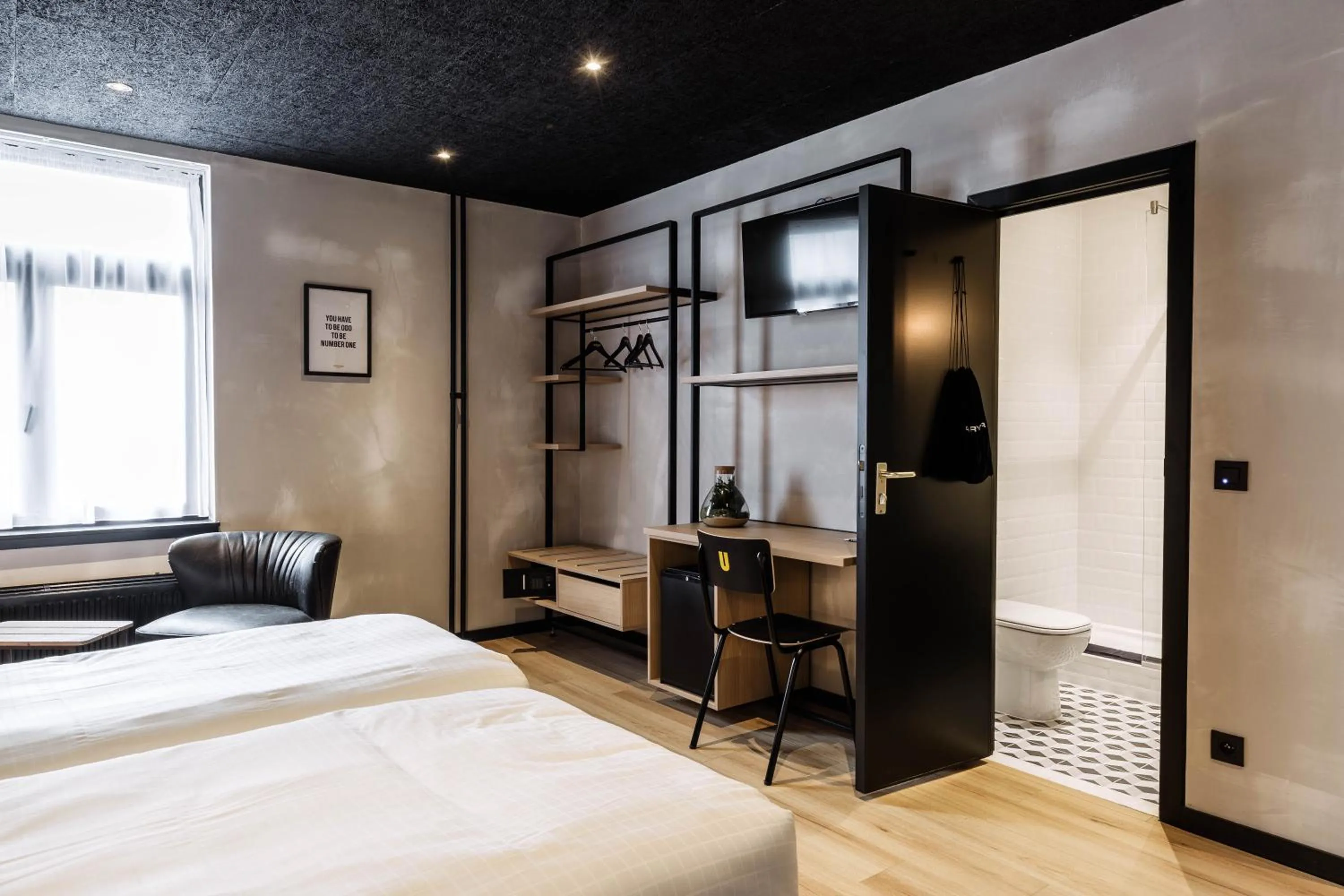 Bed in Upstairs Hotel