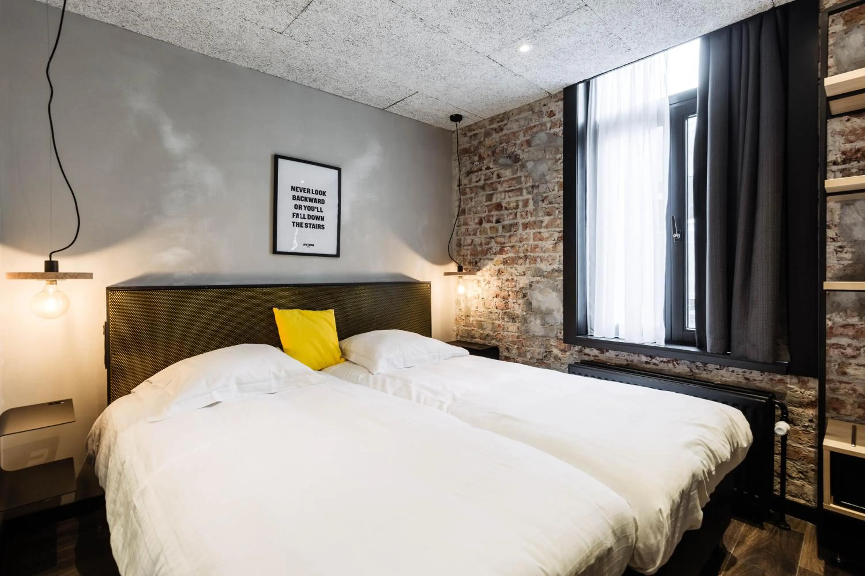 Bed in Upstairs Hotel