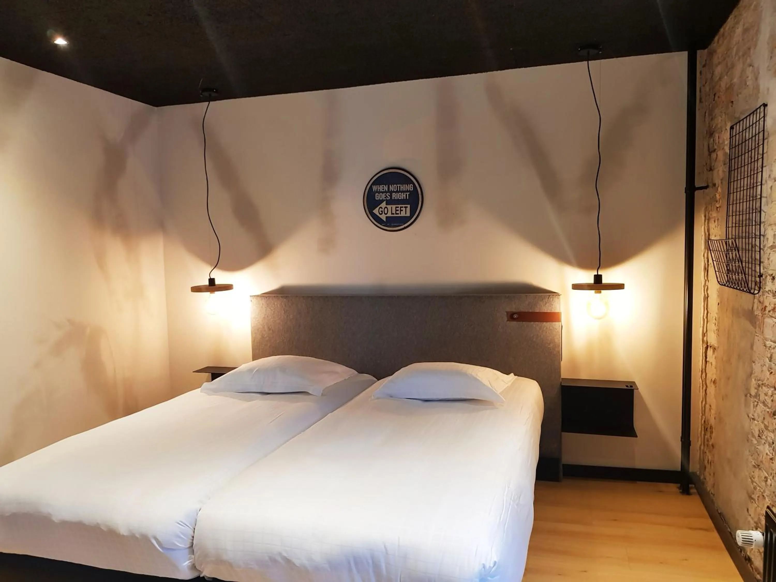 Bed in Upstairs Hotel