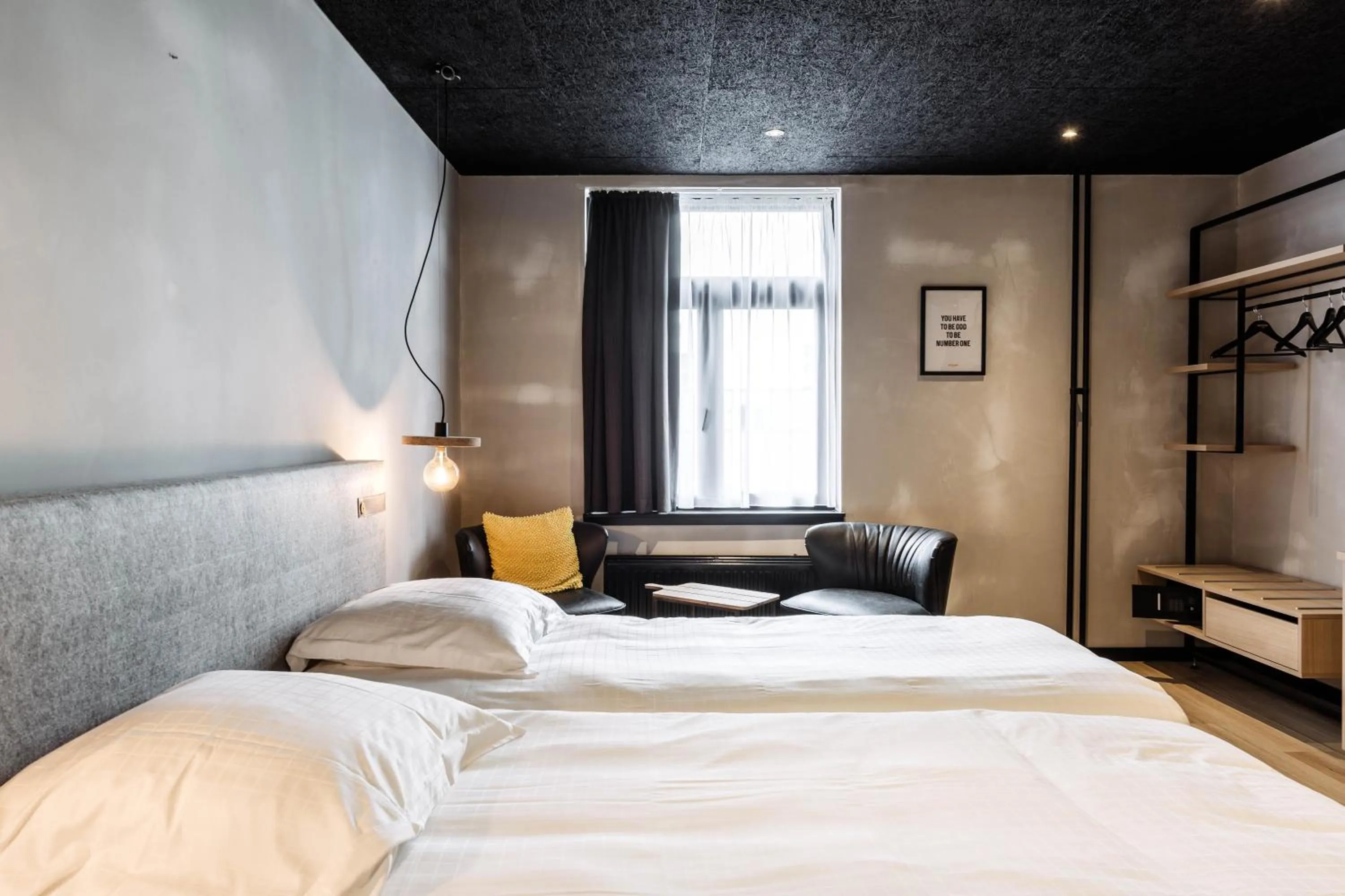 Bed in Upstairs Hotel