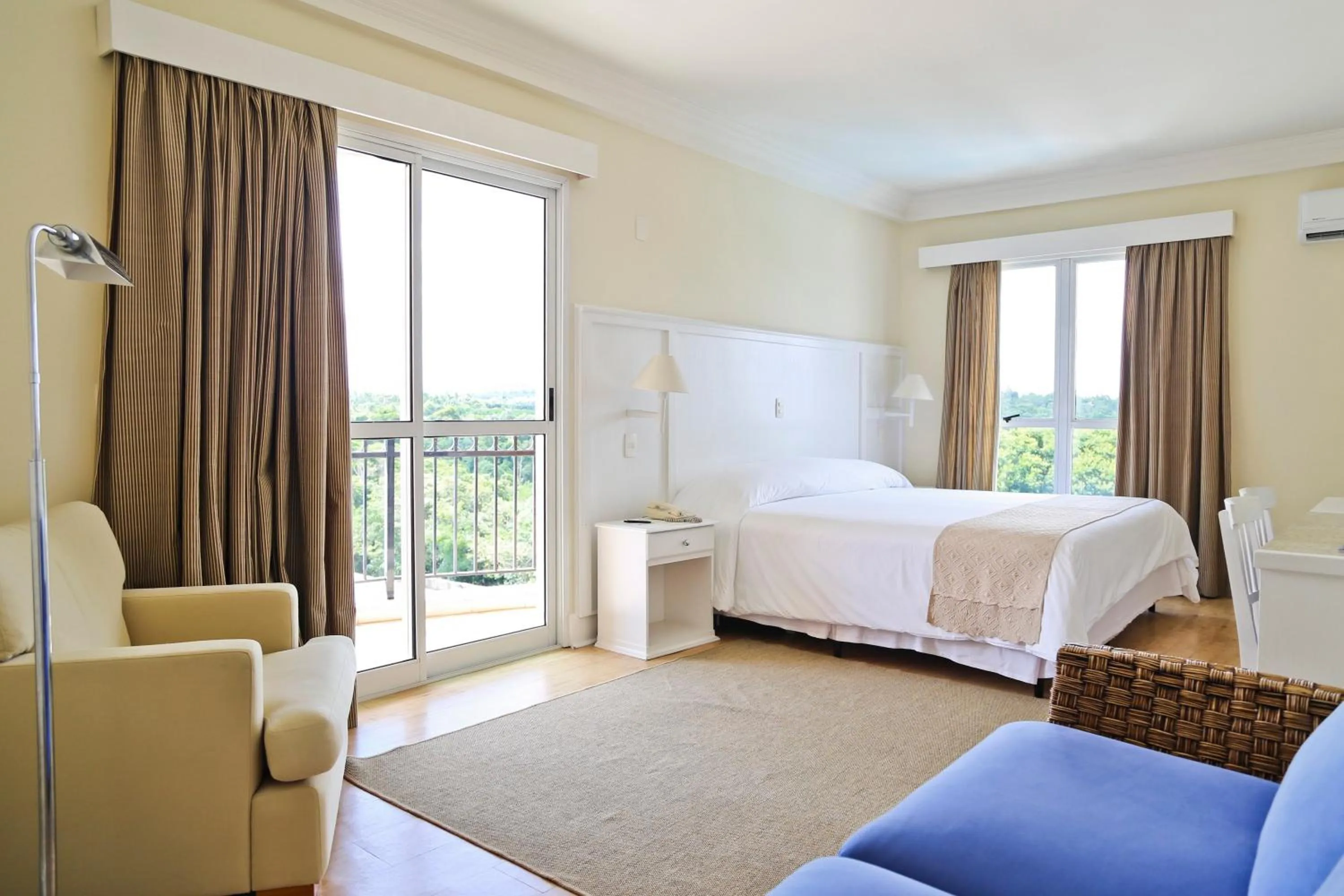 Living room, Bed in Vitória Hotel Convention Indaiatuba