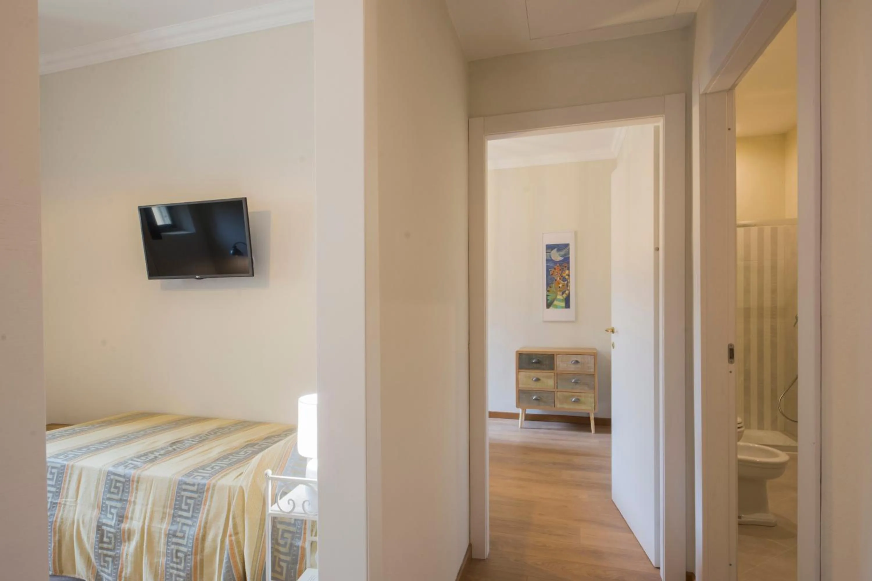 Bedroom, Bed in Iris Apartments by Mmega