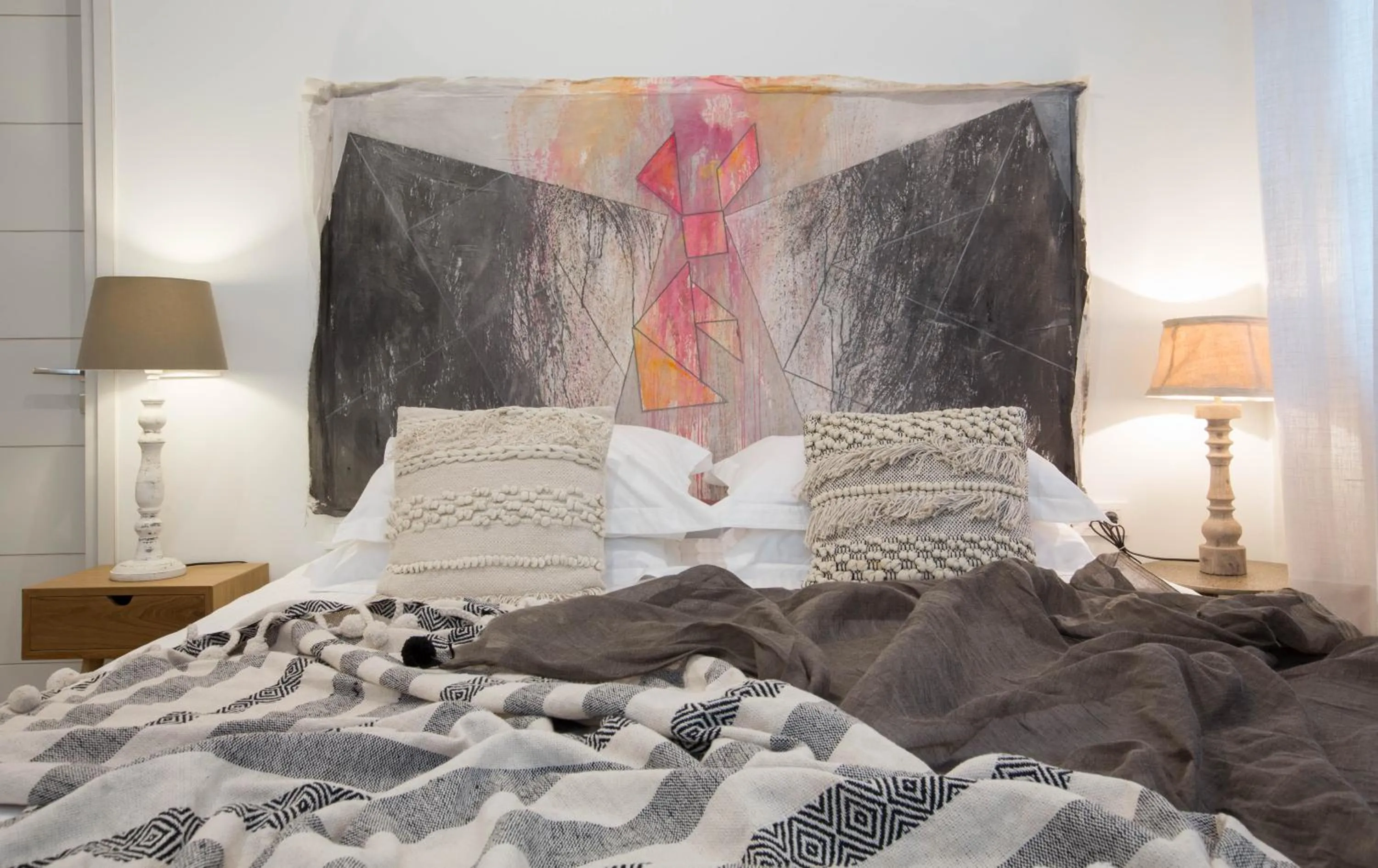 Bed in Amymone Suites