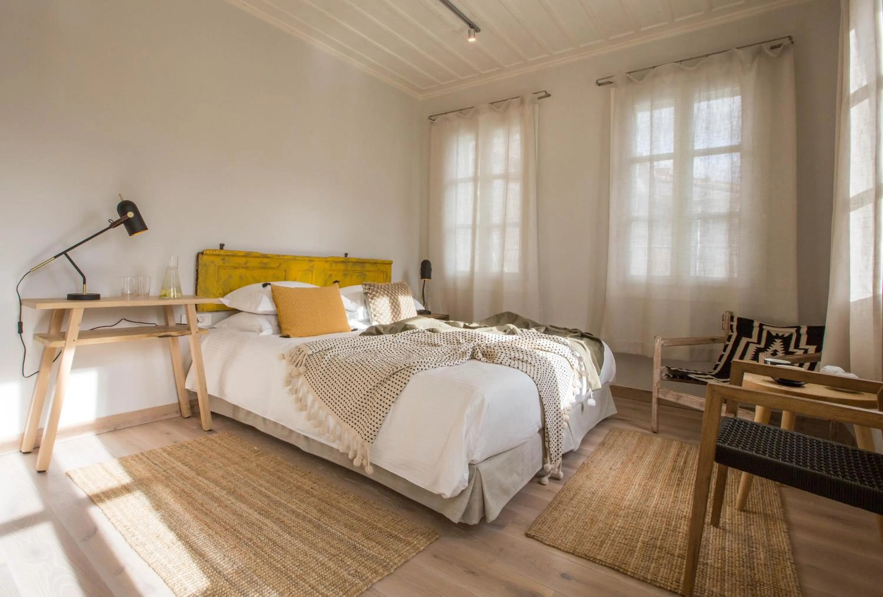 Bed in Amymone Suites