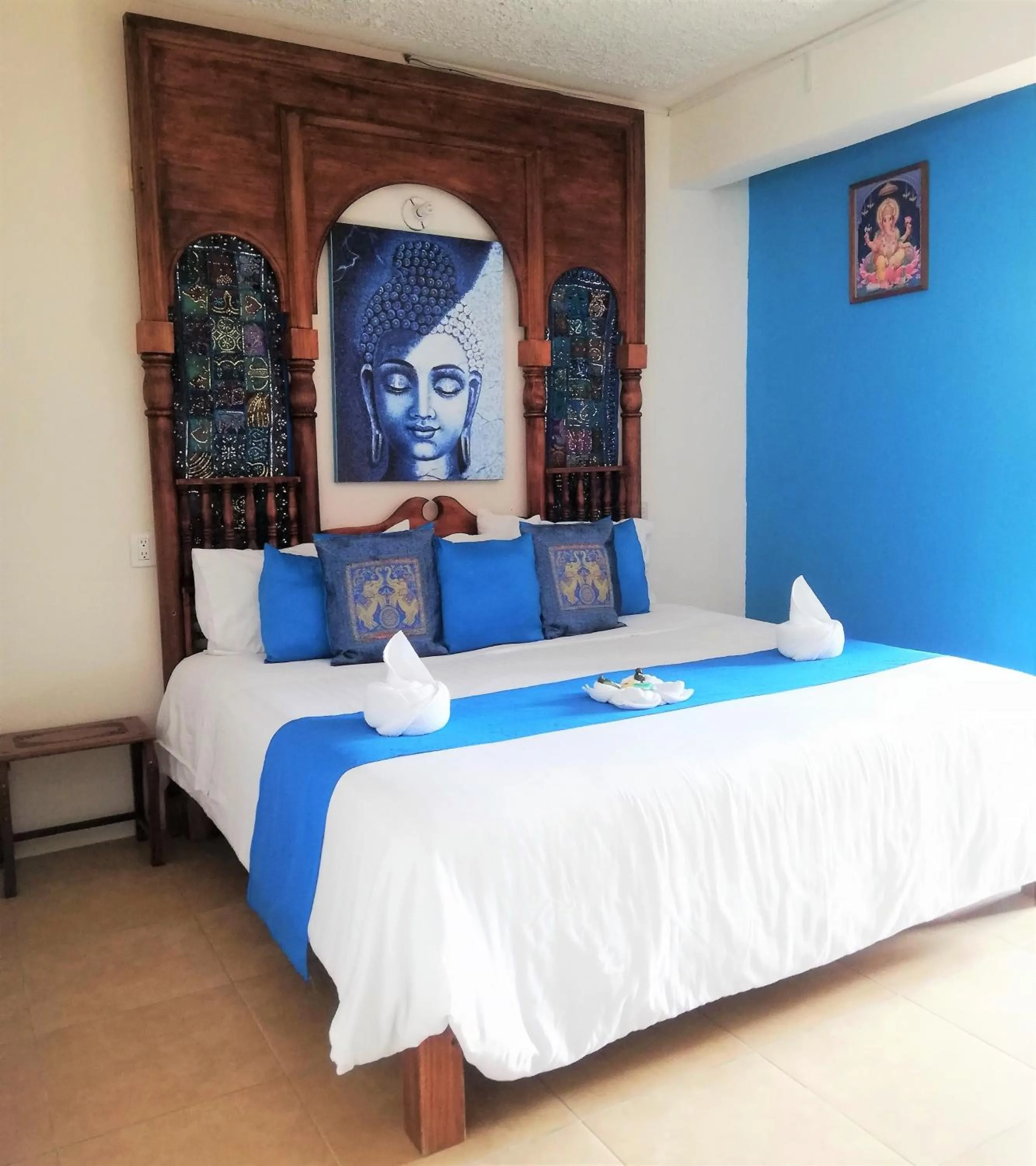 Bed in Ganesha Hotel