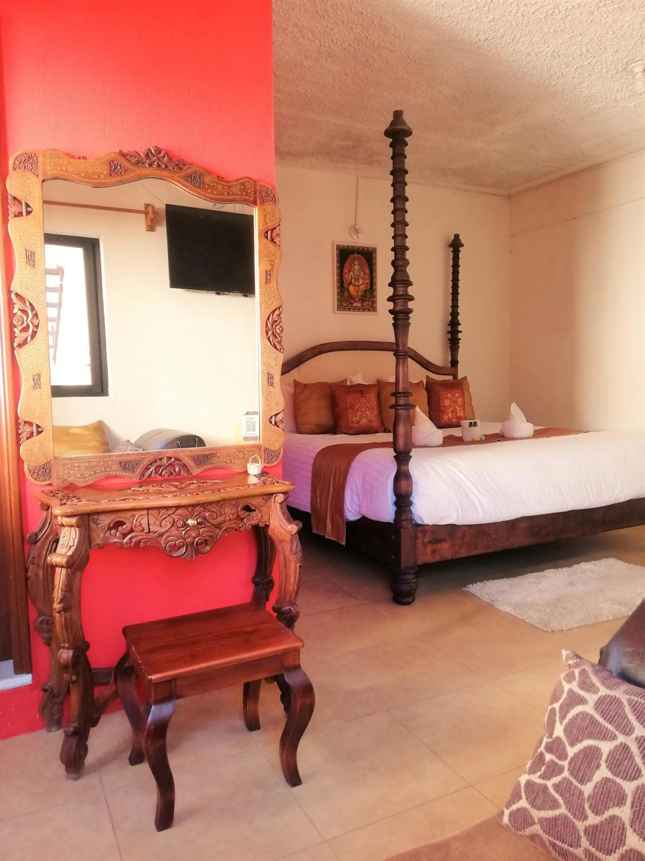 Bed in Ganesha Hotel