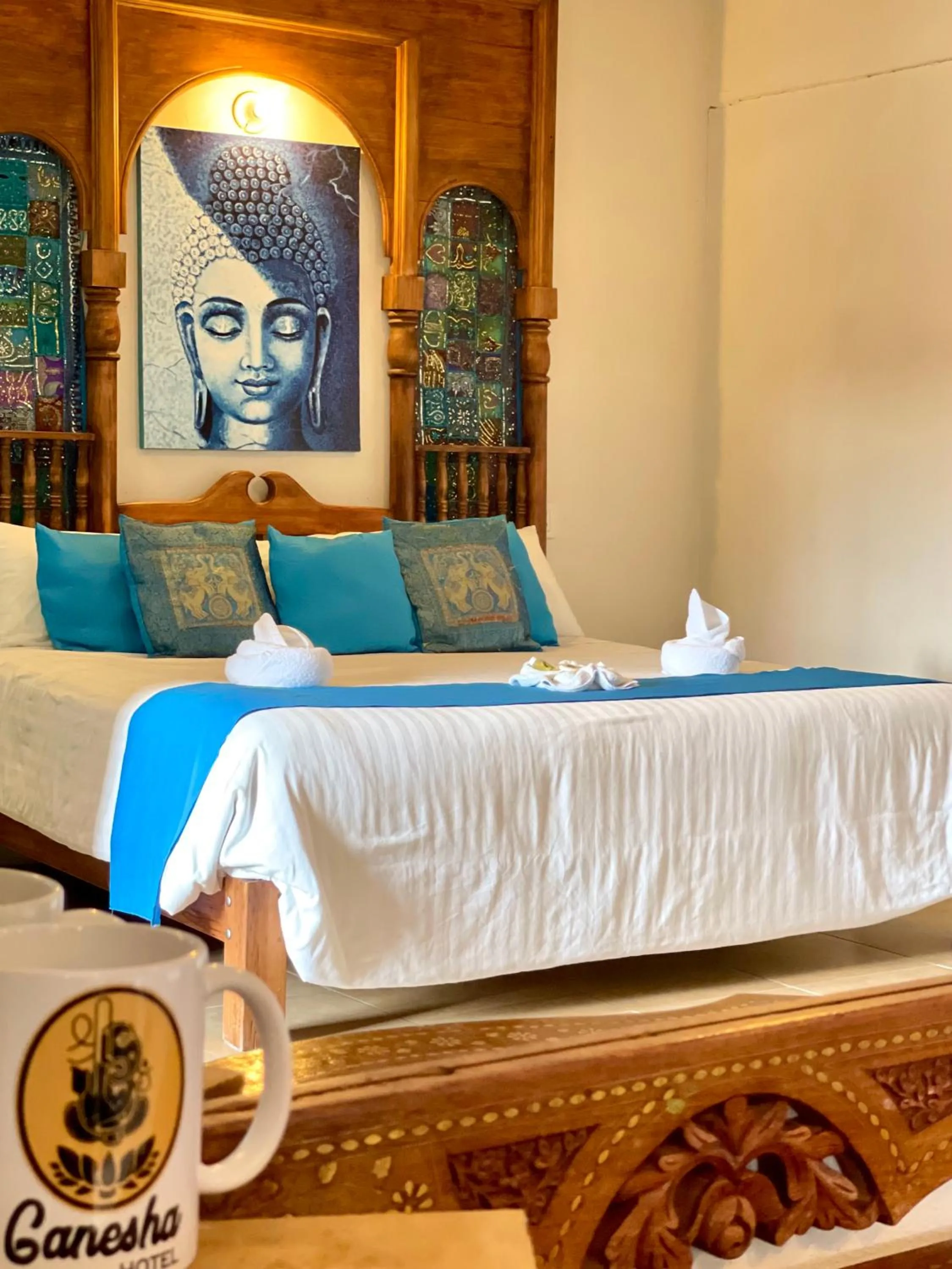 Bed in Ganesha Hotel