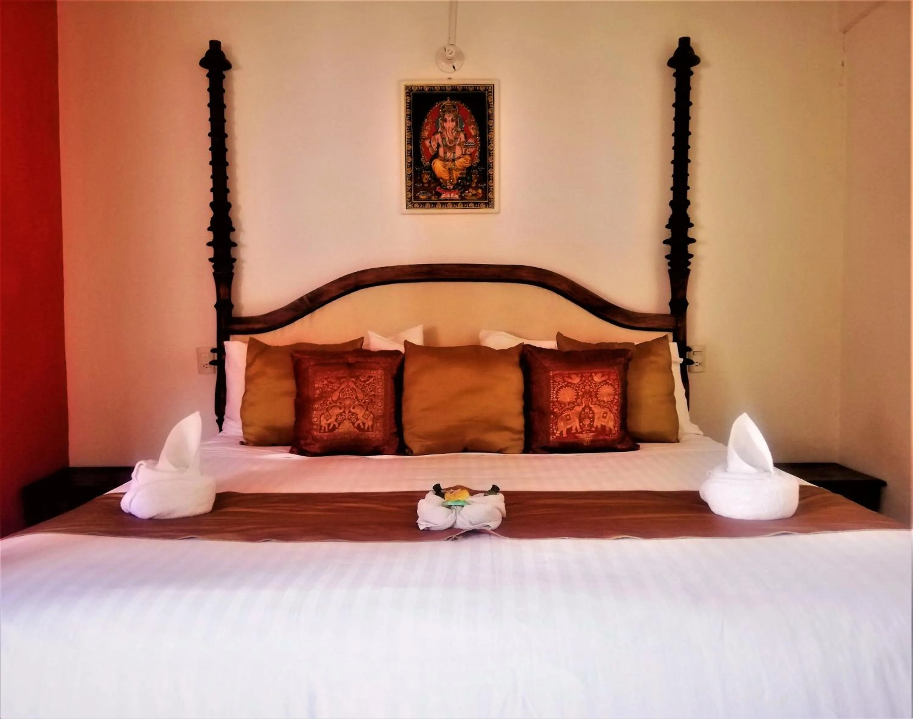 Bed in Ganesha Hotel