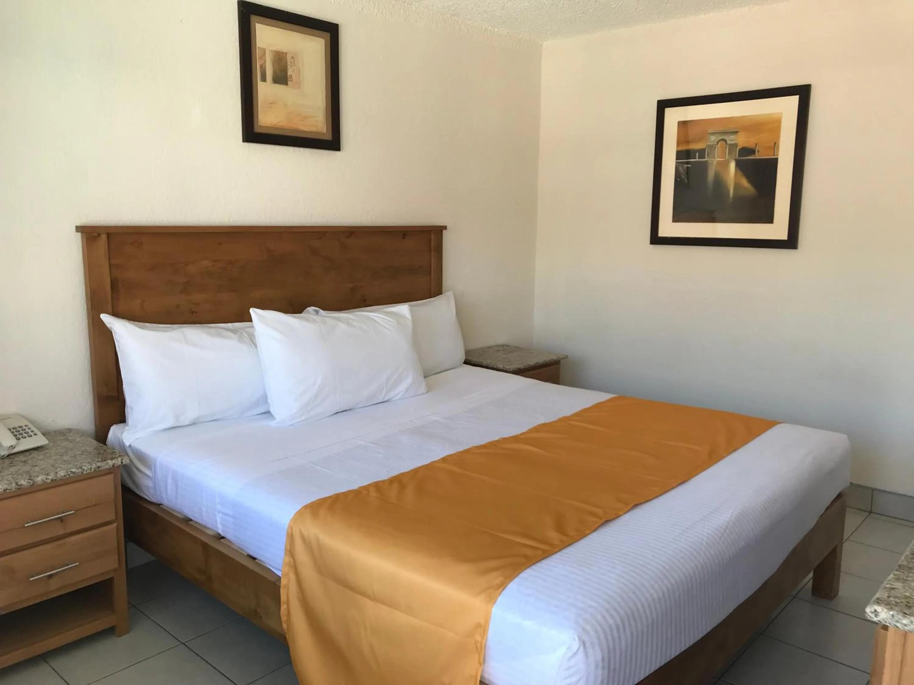 Bed in Hotel Guillen Jr