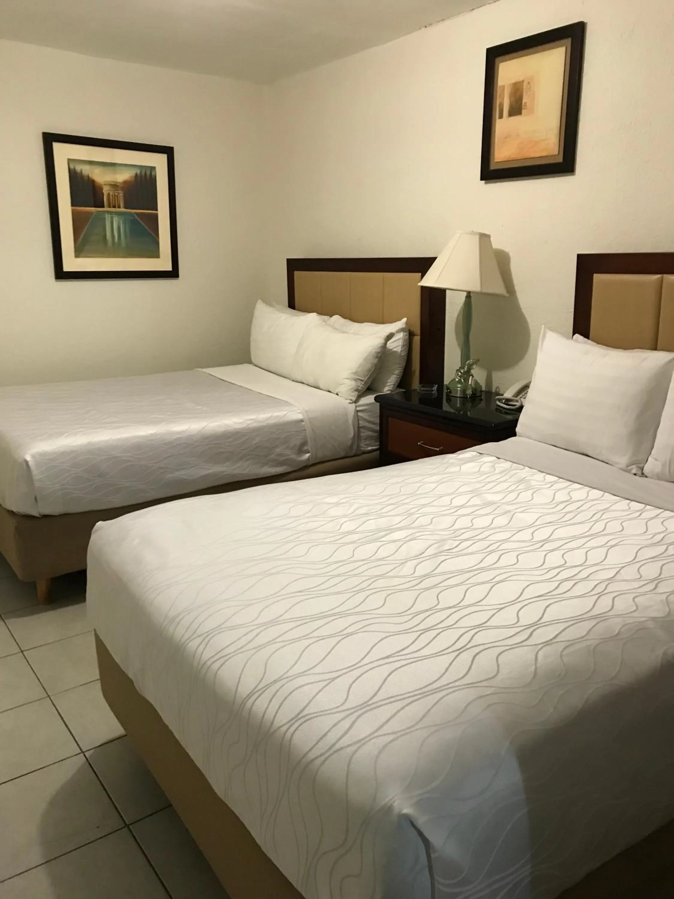 Bed in Hotel Guillen Jr