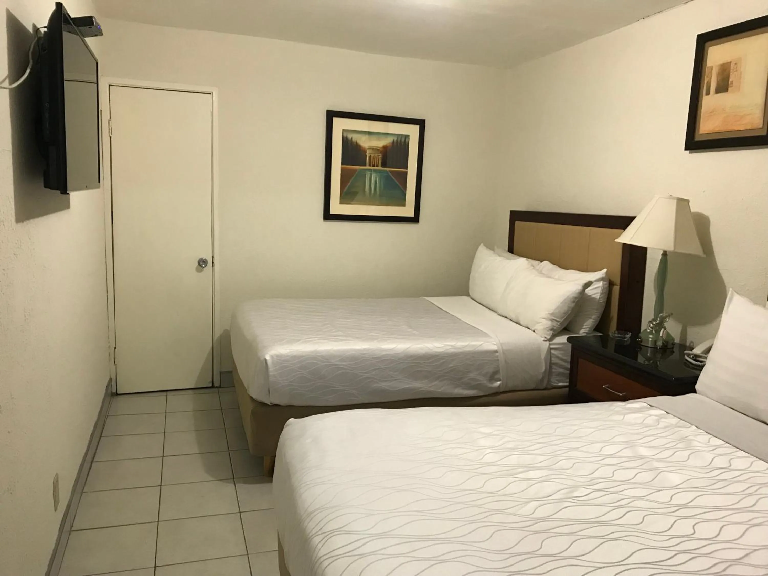 Bed in Hotel Guillen Jr