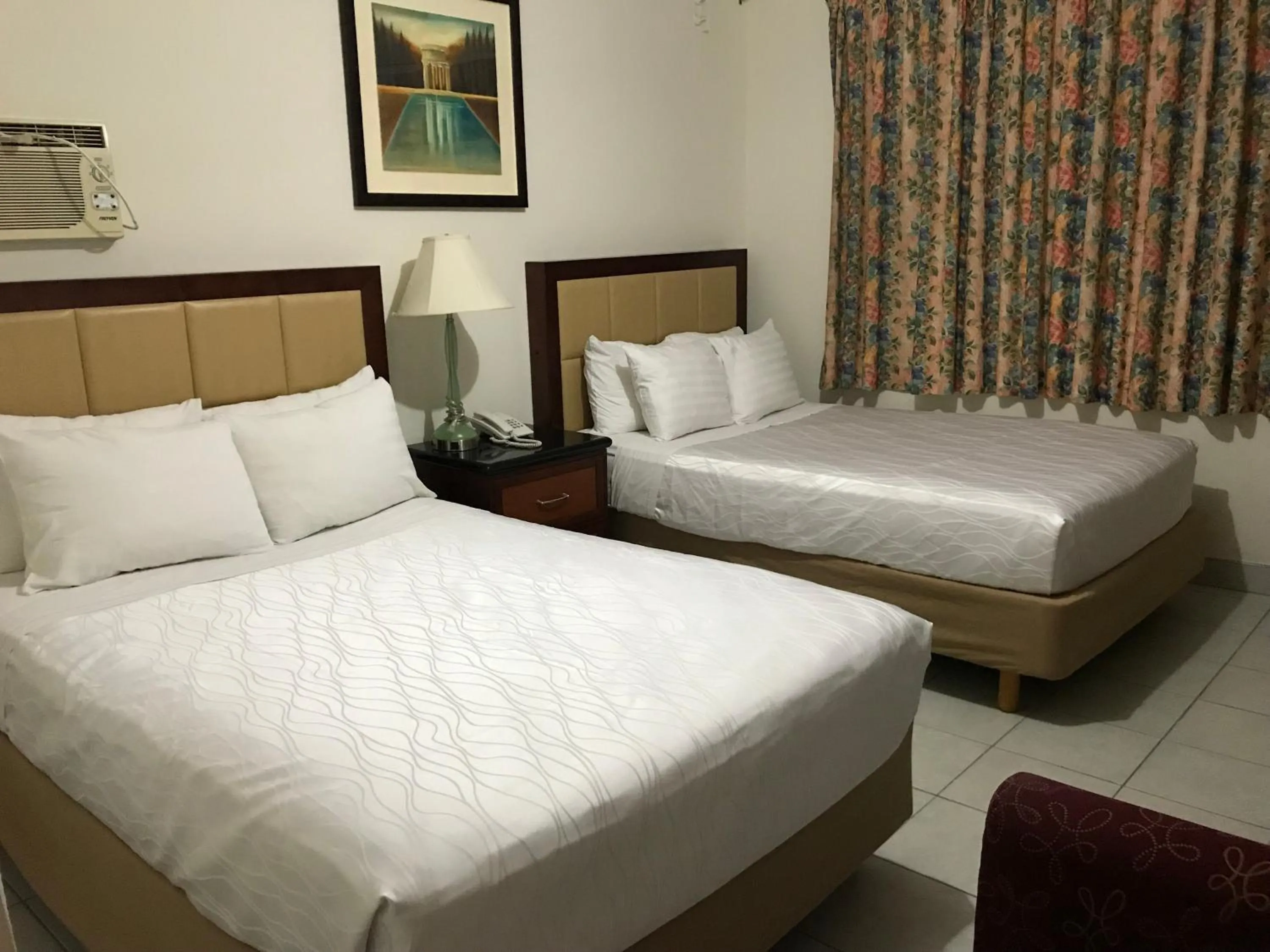 Bed in Hotel Guillen Jr