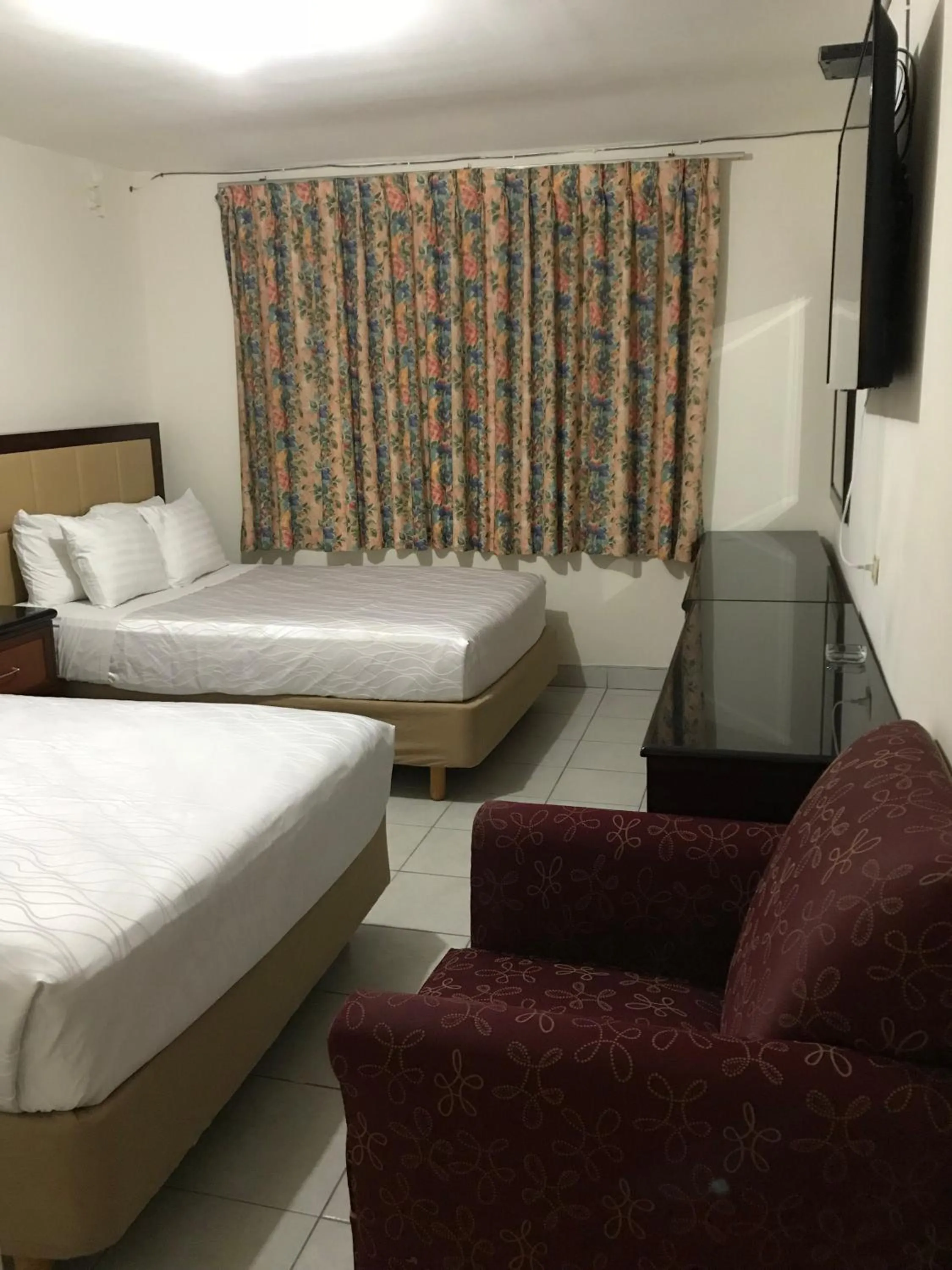 Bed in Hotel Guillen Jr