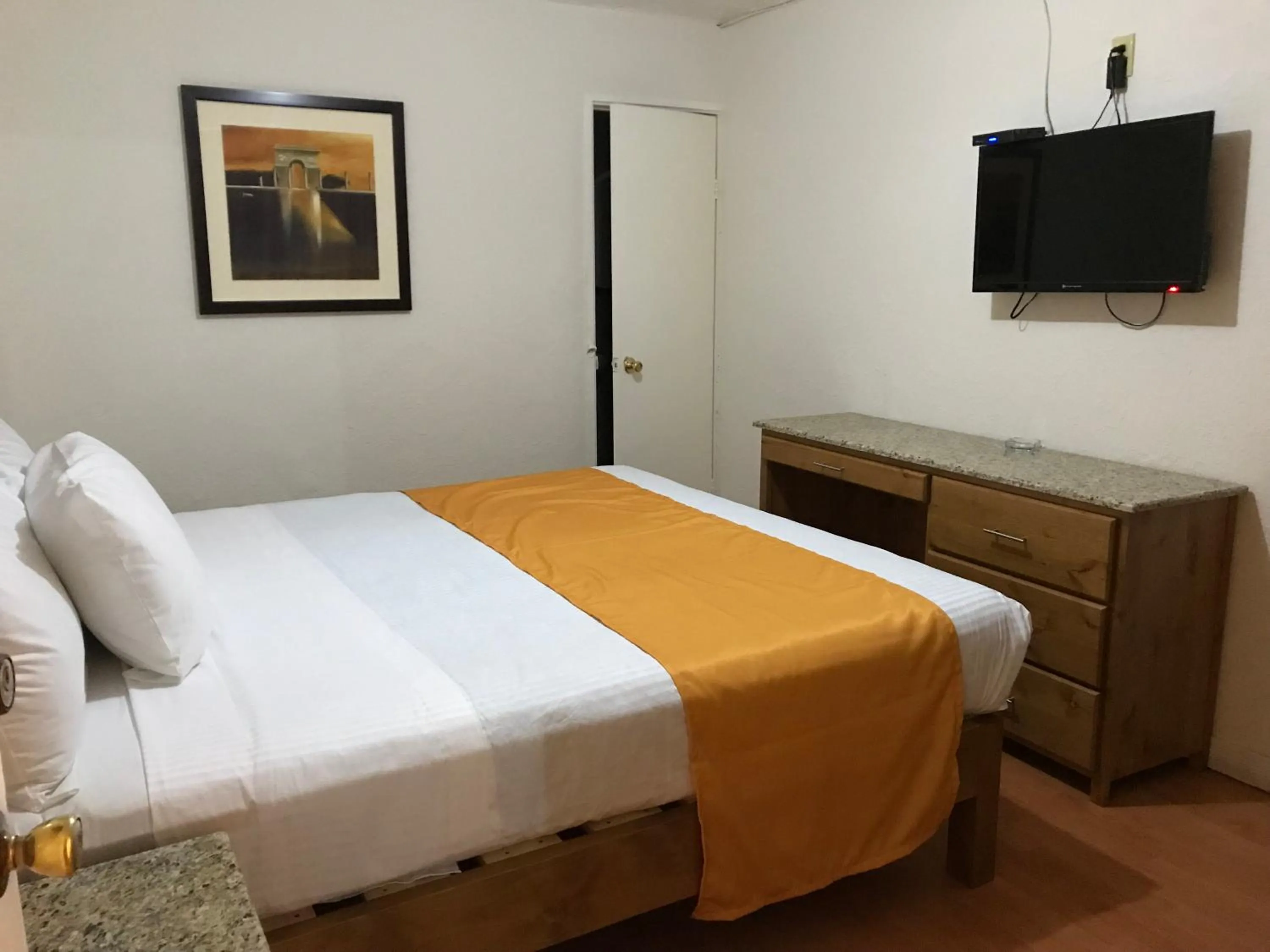 Bed in Hotel Guillen Jr