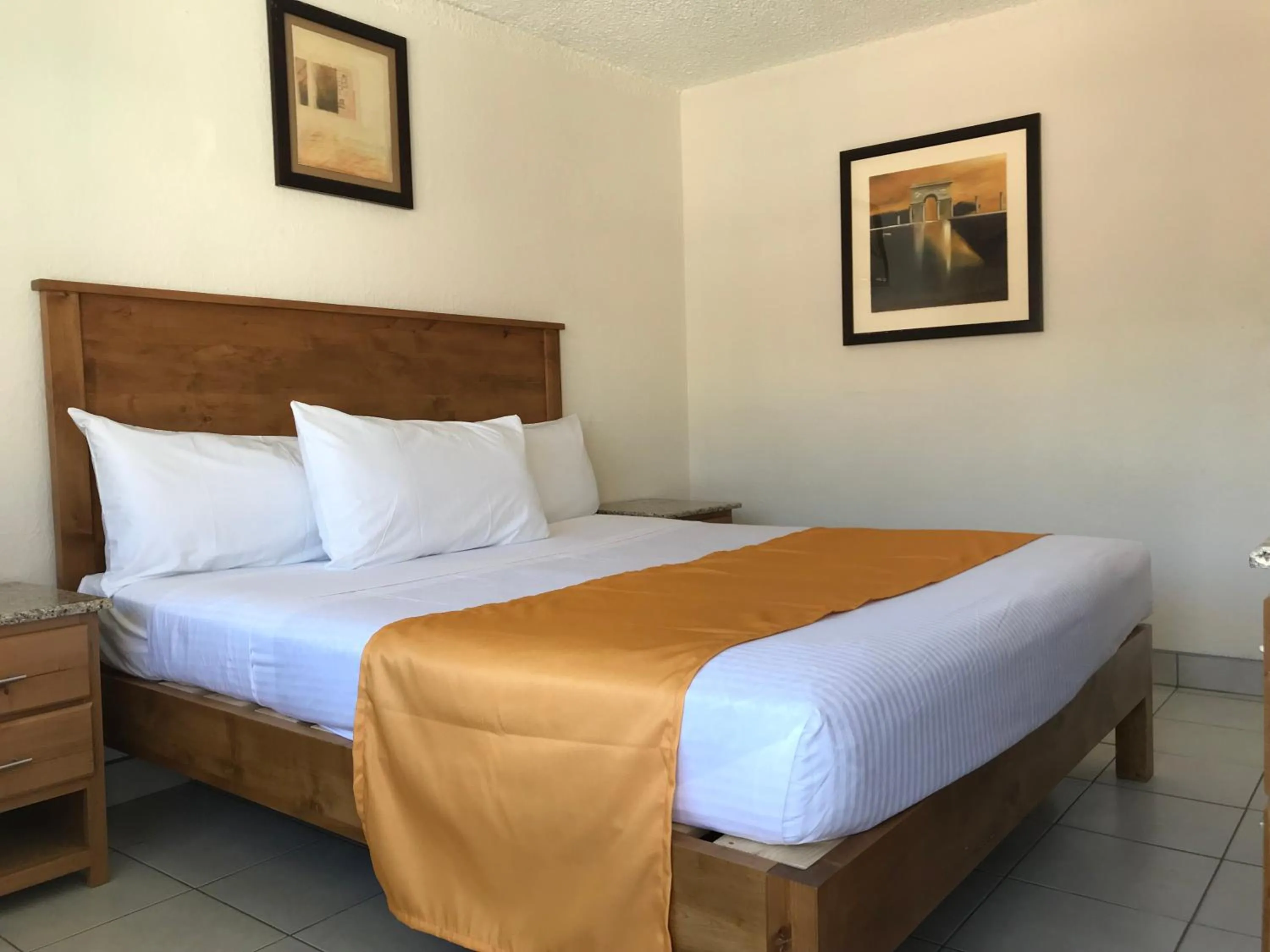 Bed in Hotel Guillen Jr