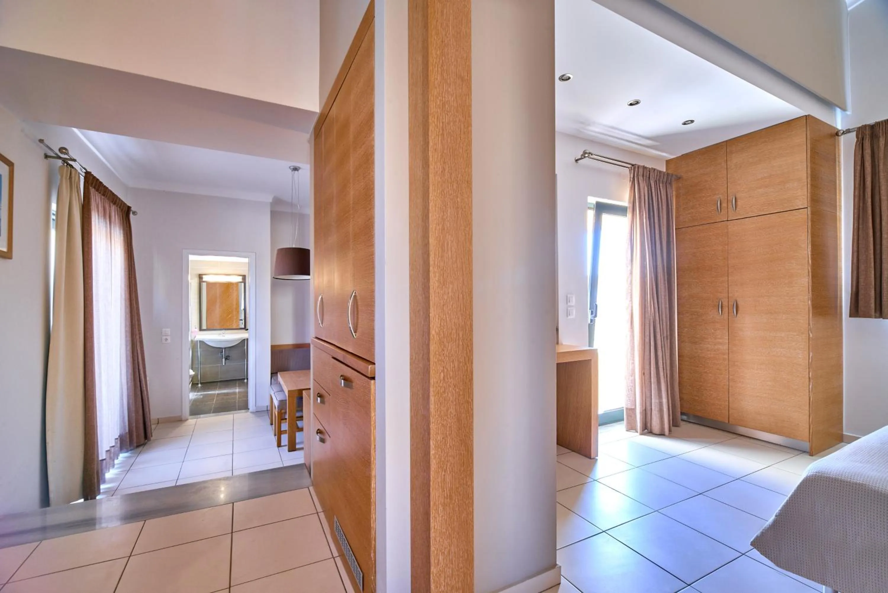 Bed in Silver Beach Hotel & Apartments