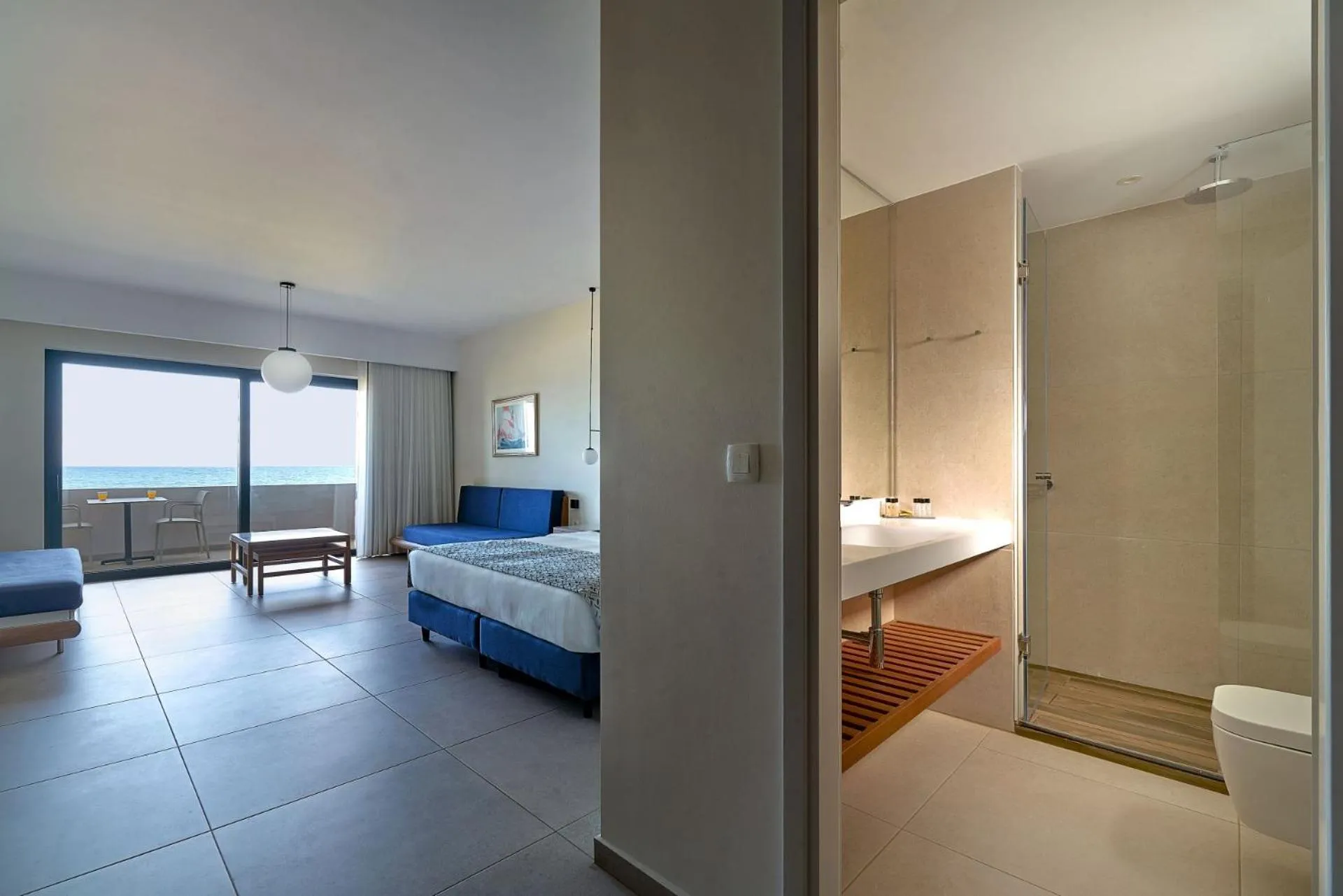 Bed in Silver Beach Hotel & Apartments