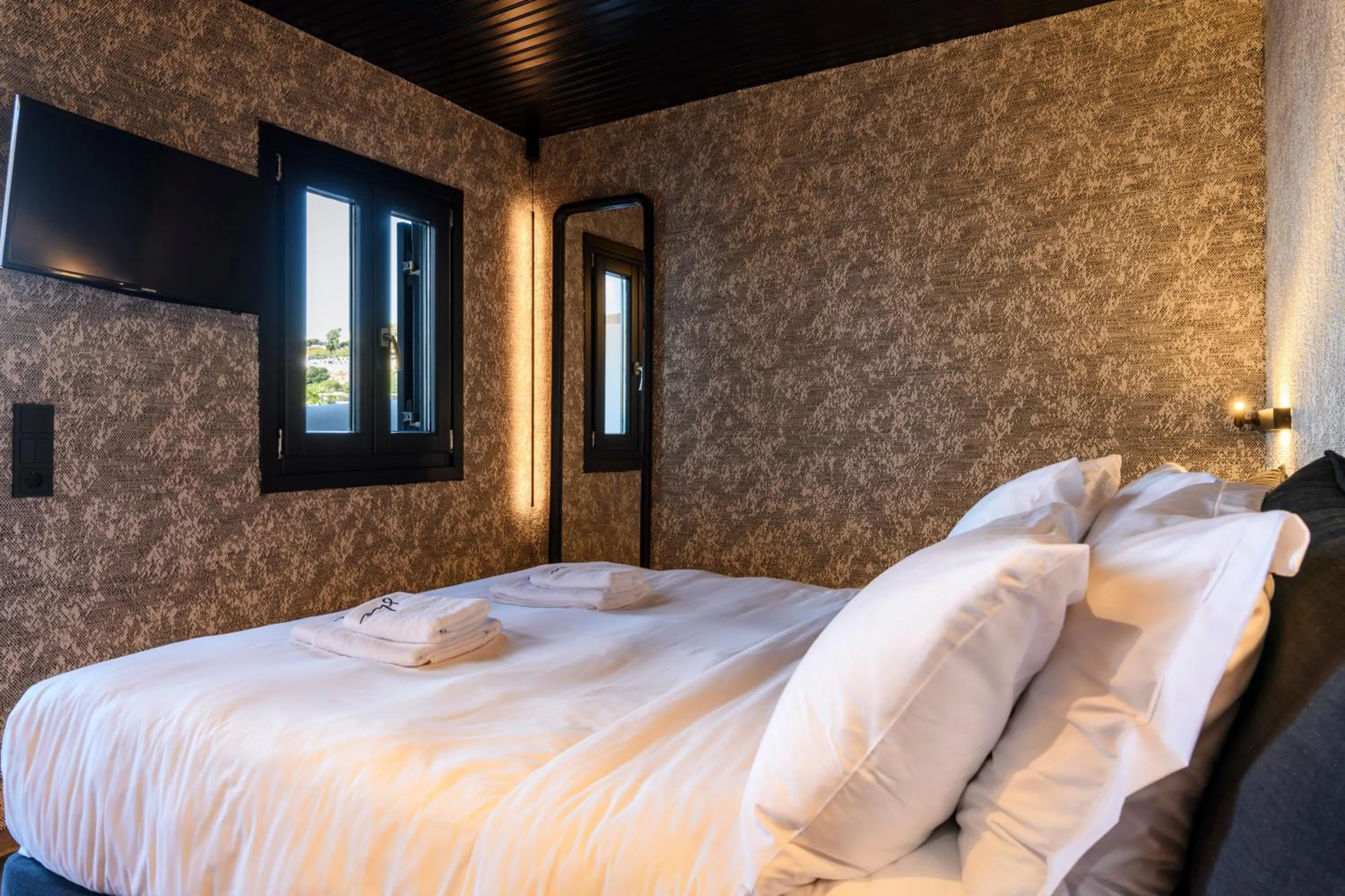 Bed in She Mykonos Boutique Hotel