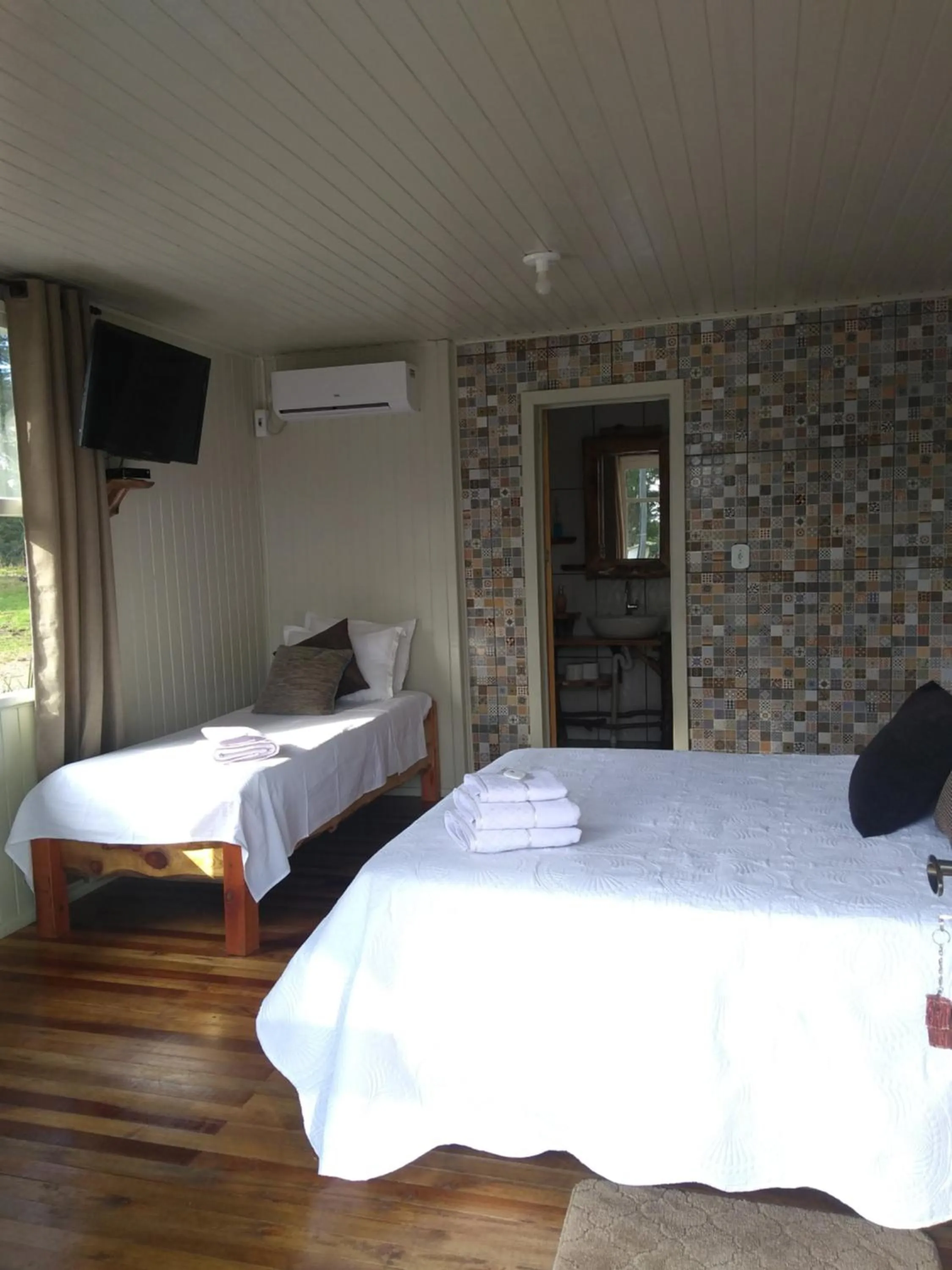 Bed in Pousada Recanto do Lago