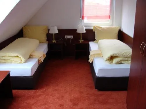 Photo of the whole room, Bed in Gasthaus Traube