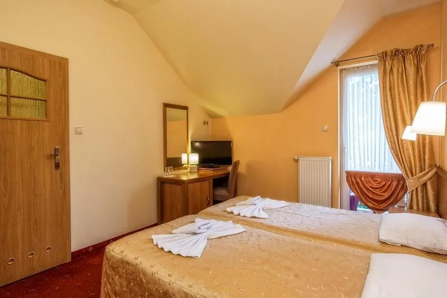 Bed in Hotel Pod Gołębiem