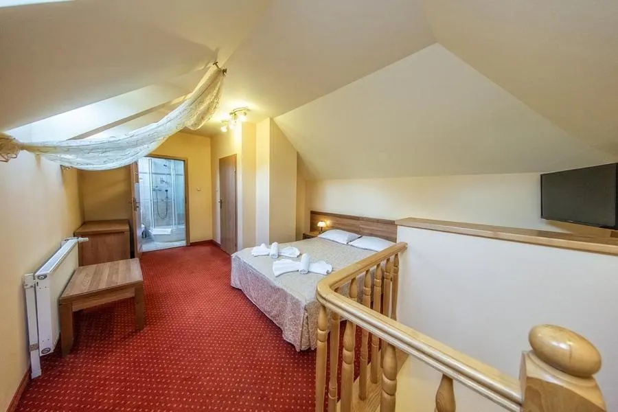 Bed in Hotel Pod Gołębiem