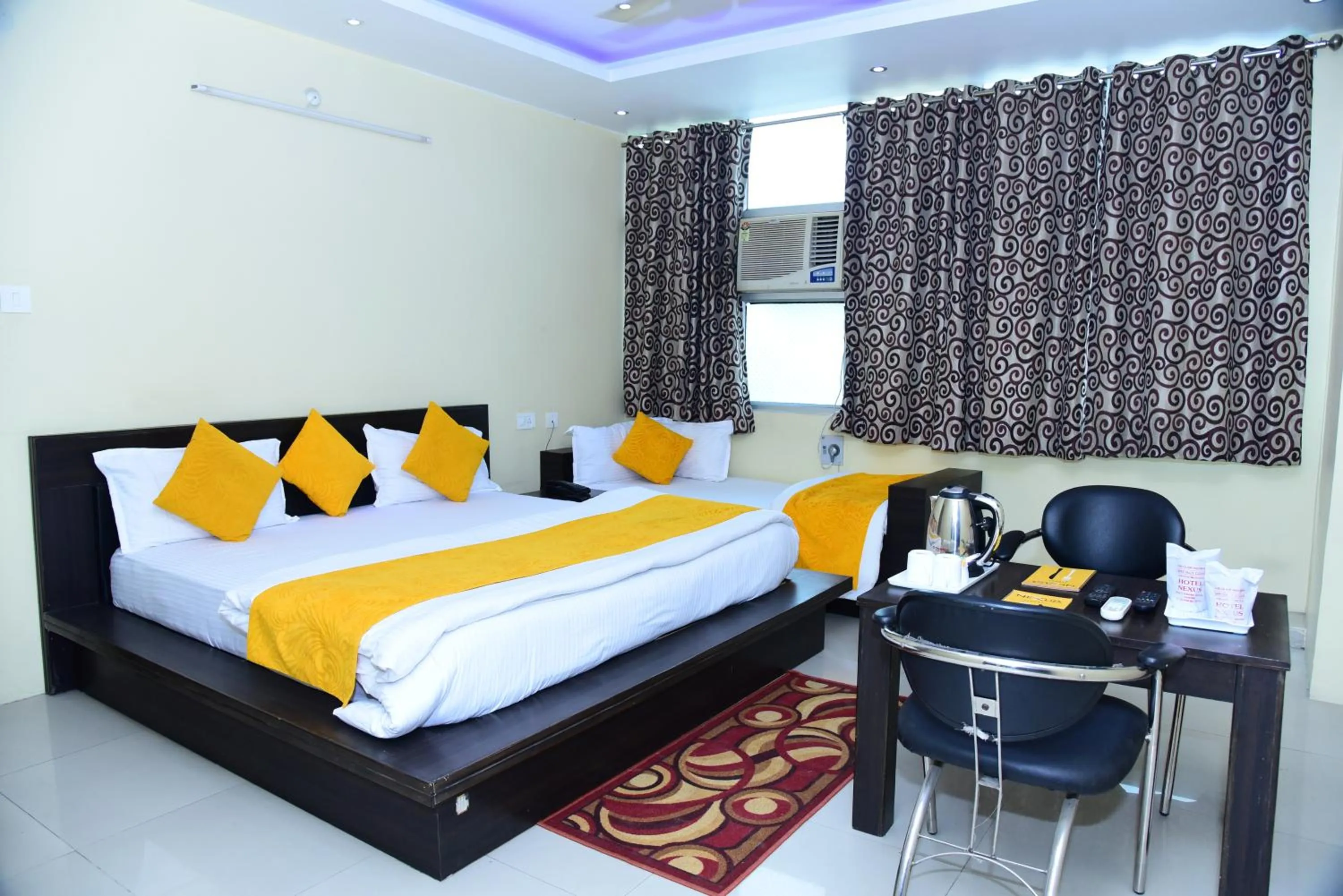 Photo of the whole room, Bed in Hotel Nexus l Hotels In Charbagh Lucknow
