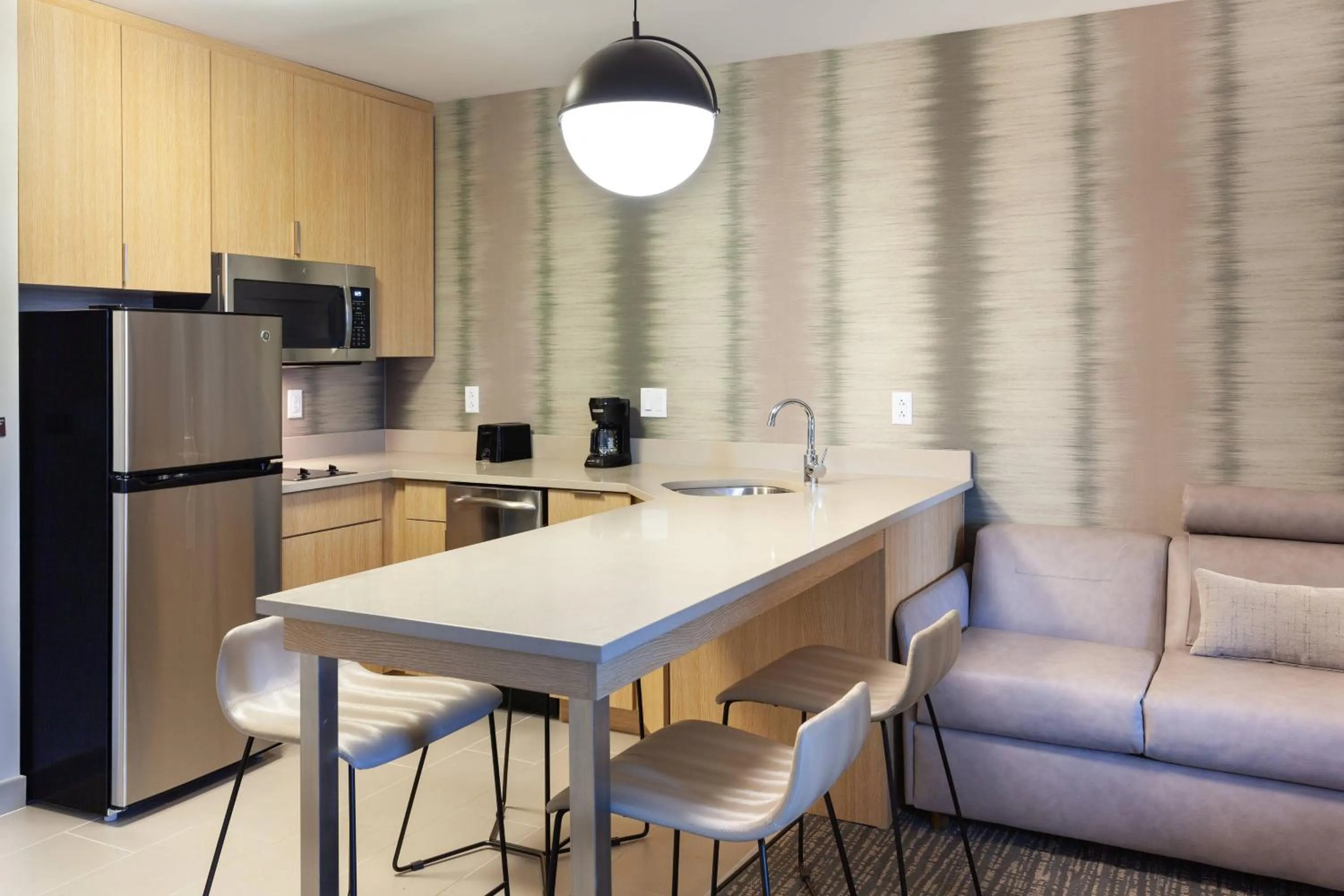 Kitchen or kitchenette in Residence Inn by Marriott Orlando at Millenia