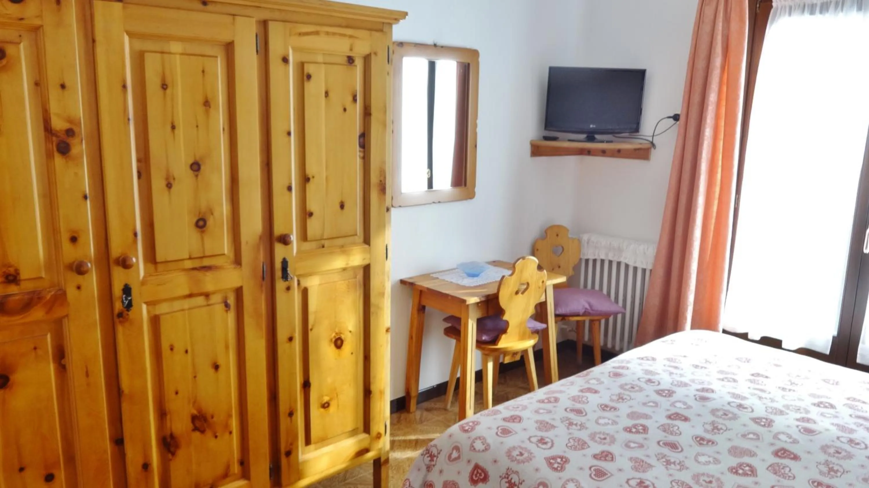 Bed in Hotel Piccolo Mondo