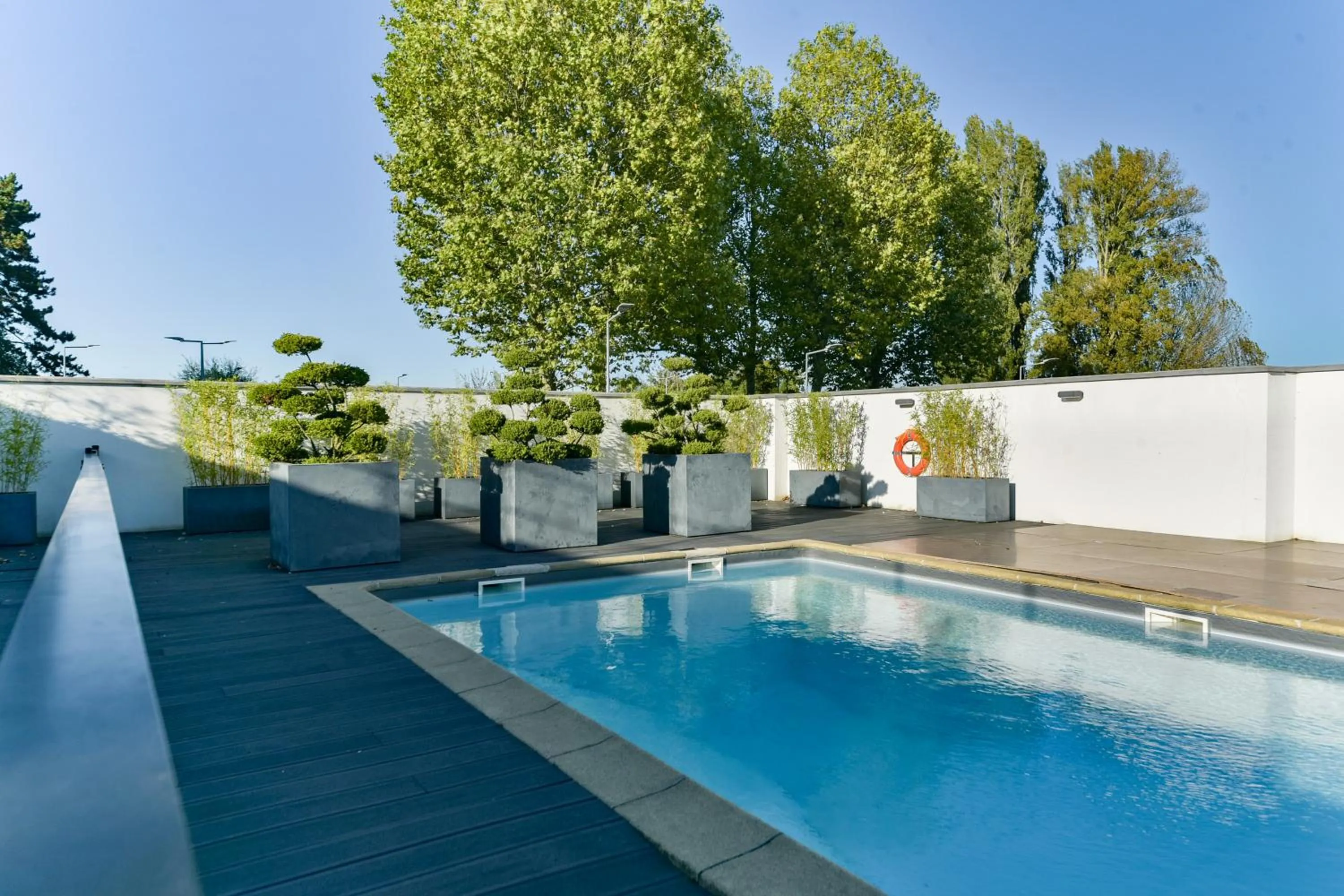 Pool view in Golden Tulip Roissy Saint Witz