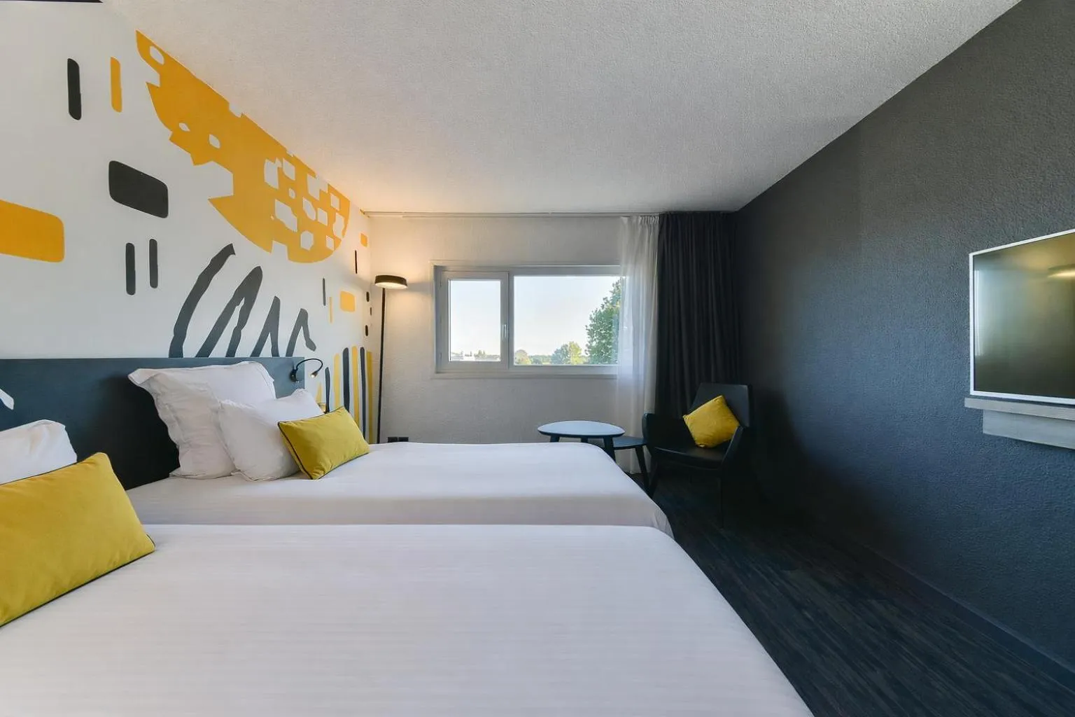 Bed in Golden Tulip Roissy Saint Witz