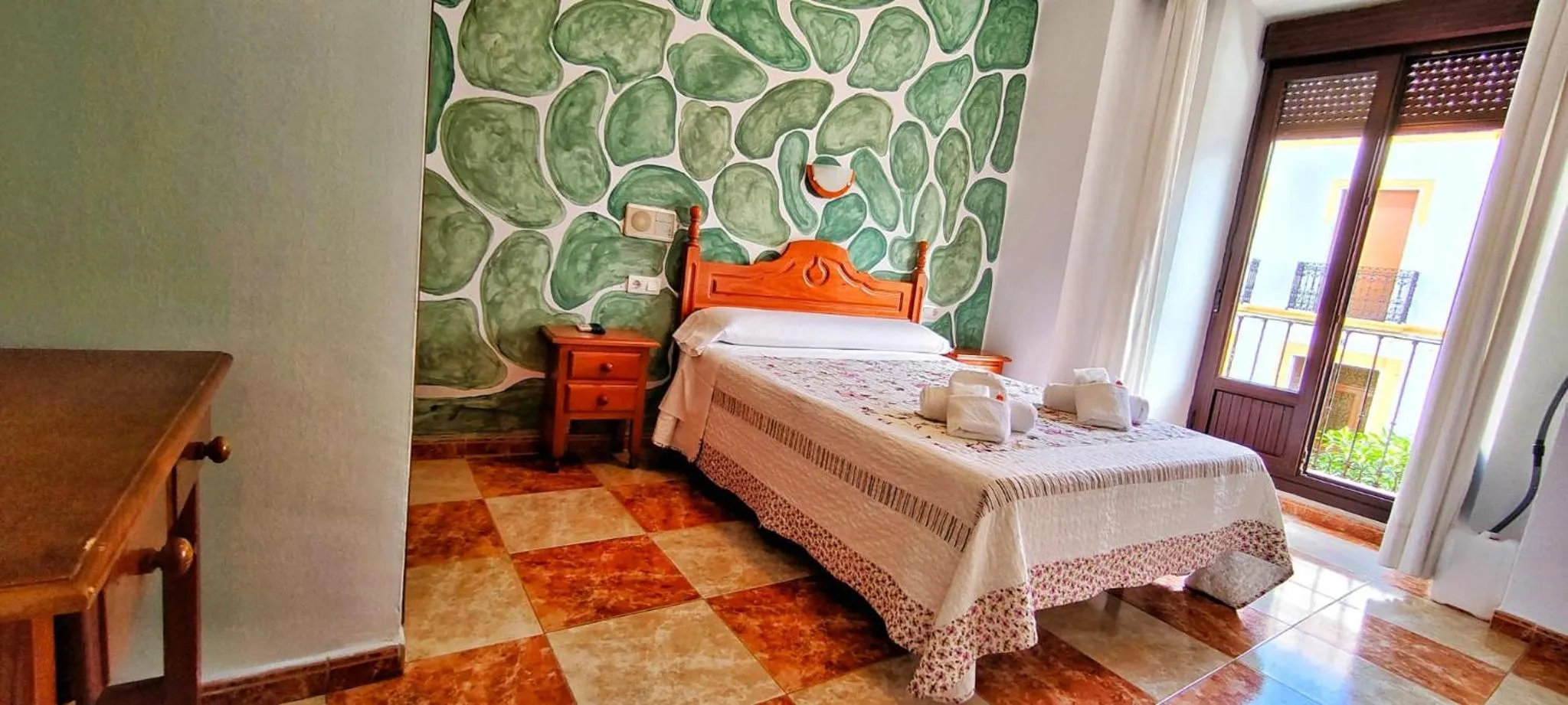 Property building, Bed in Hotel Virgen de los Reyes