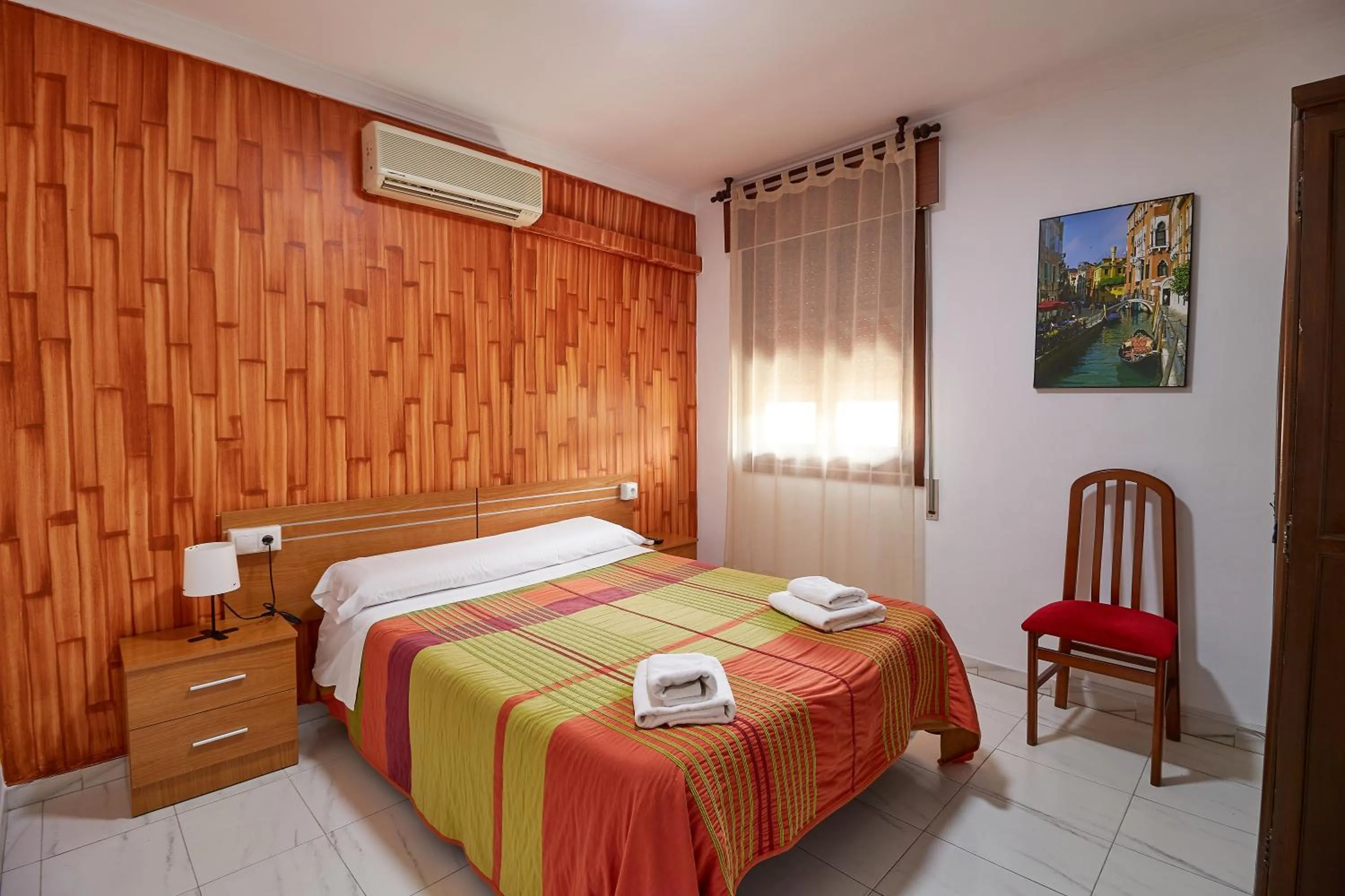 Bed in Hotel Virgen de los Reyes