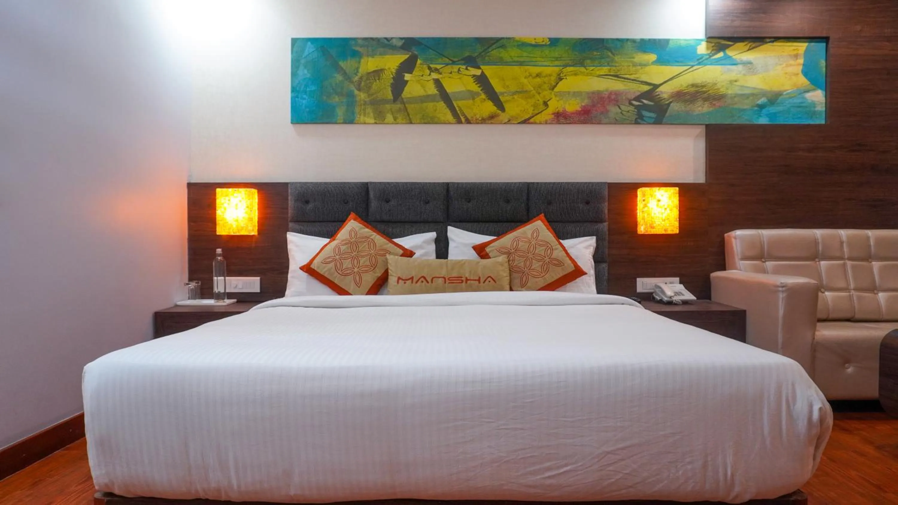 Bed in Hotel Mansha Regency