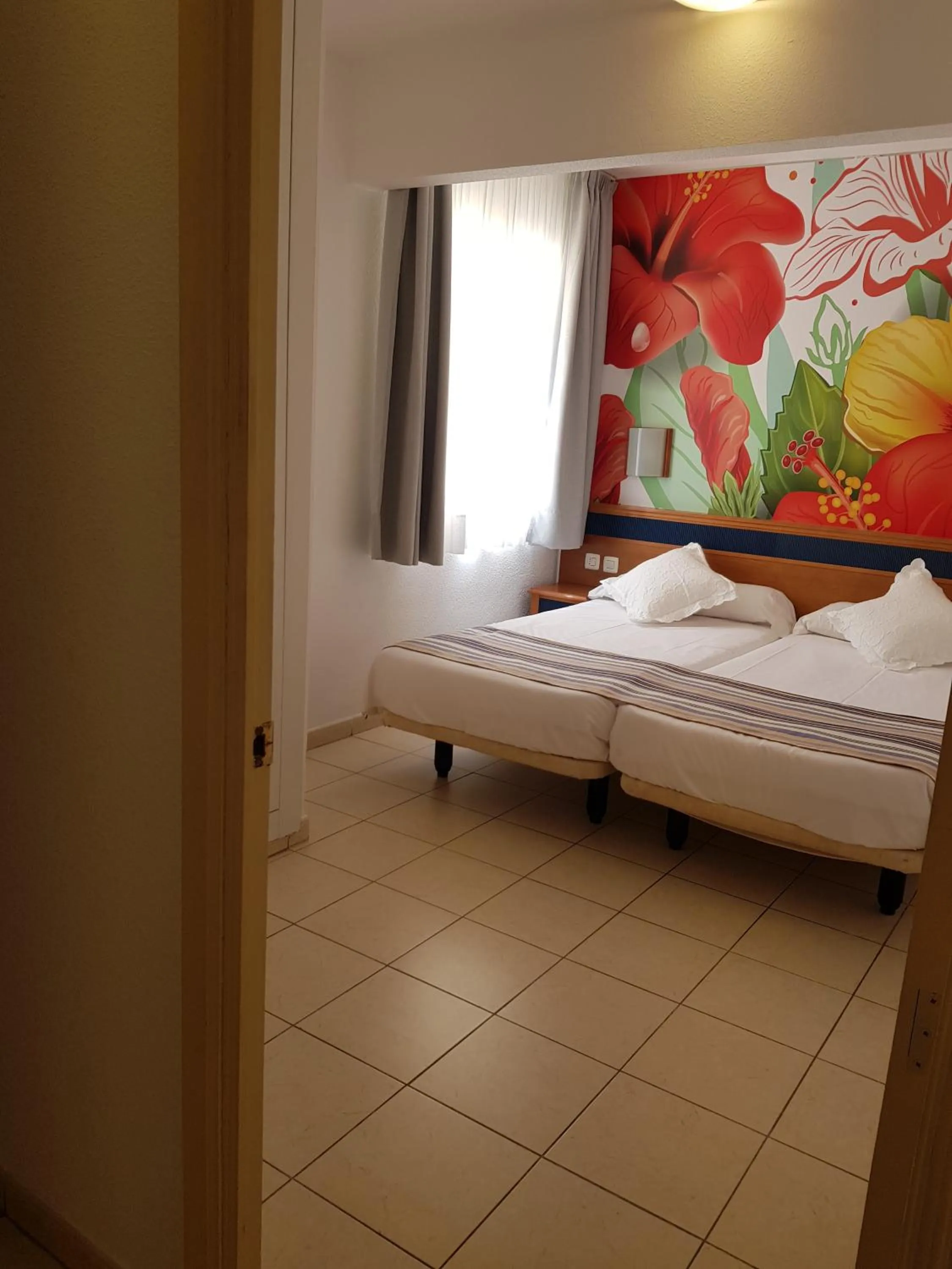 Bed in Apartamentos Palm Garden