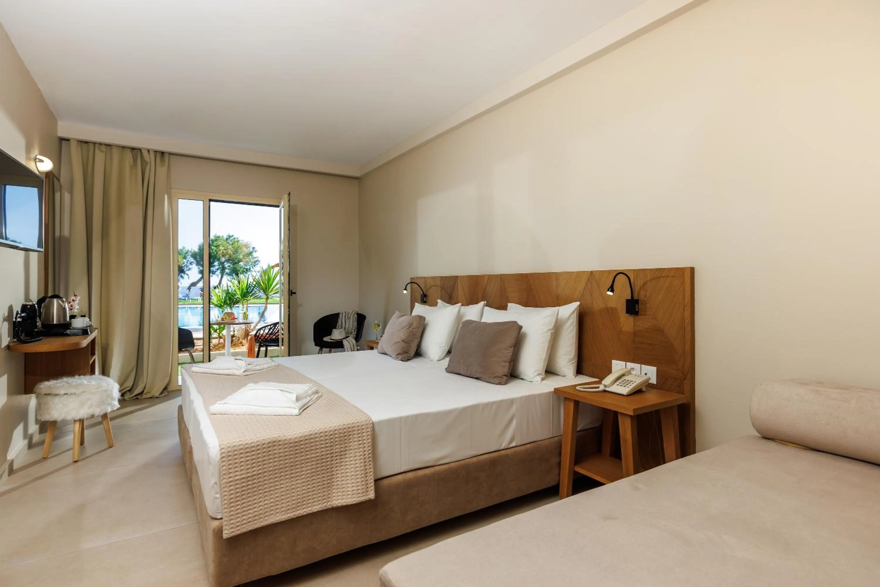 Bed in Malia Bay Beach Hotel & Bungalows
