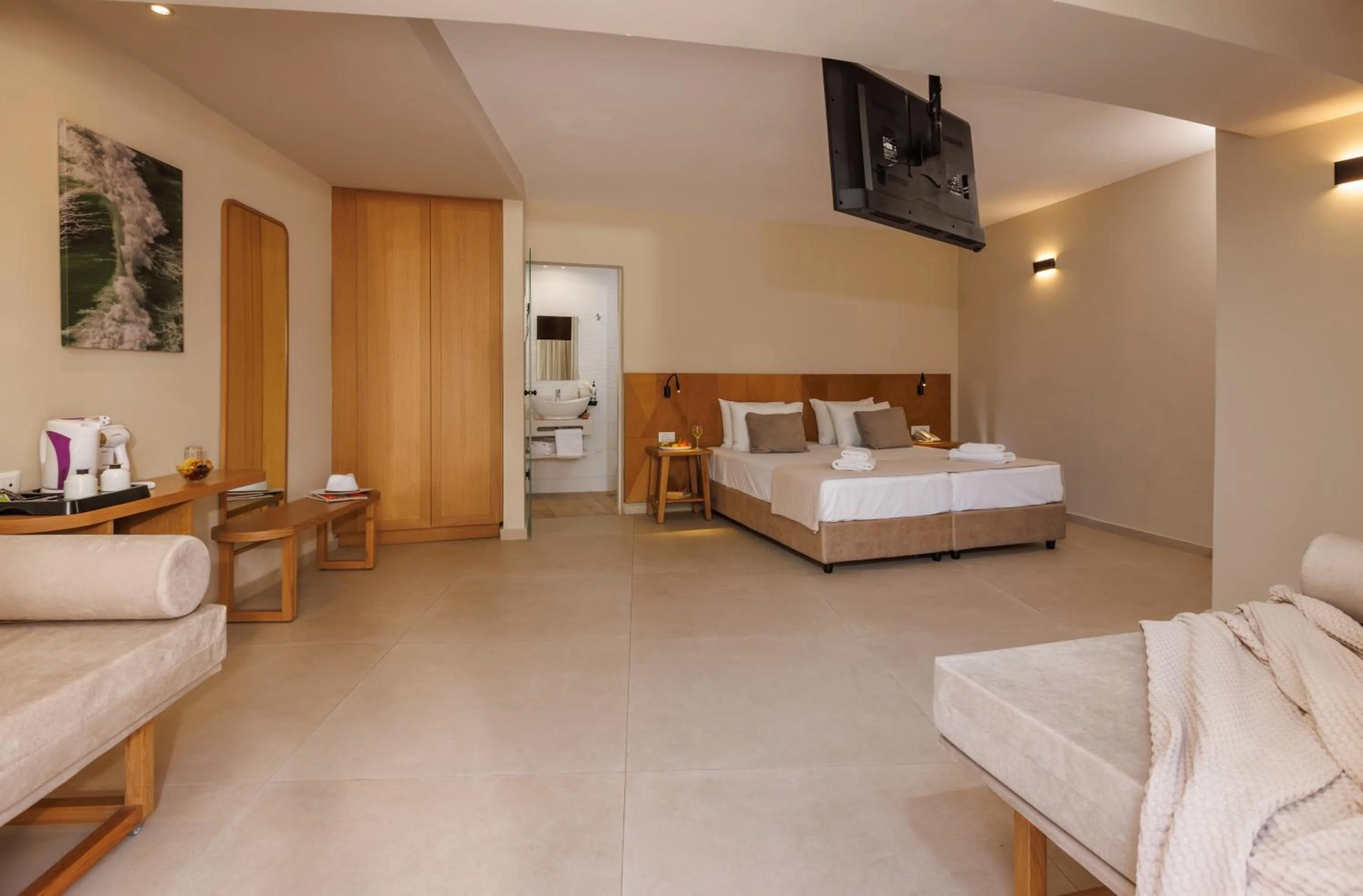 Photo of the whole room, Bed in Malia Bay Beach Hotel & Bungalows