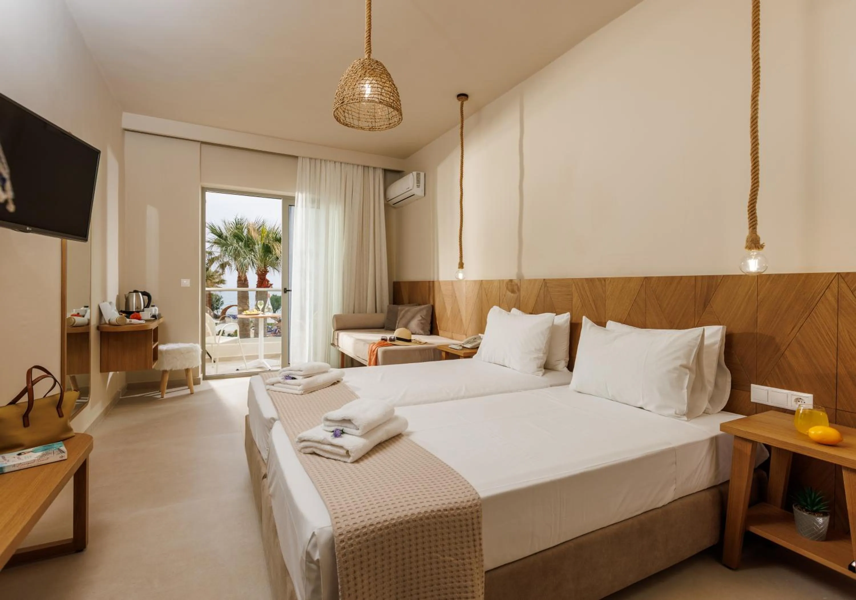 Bed in Malia Bay Beach Hotel & Bungalows