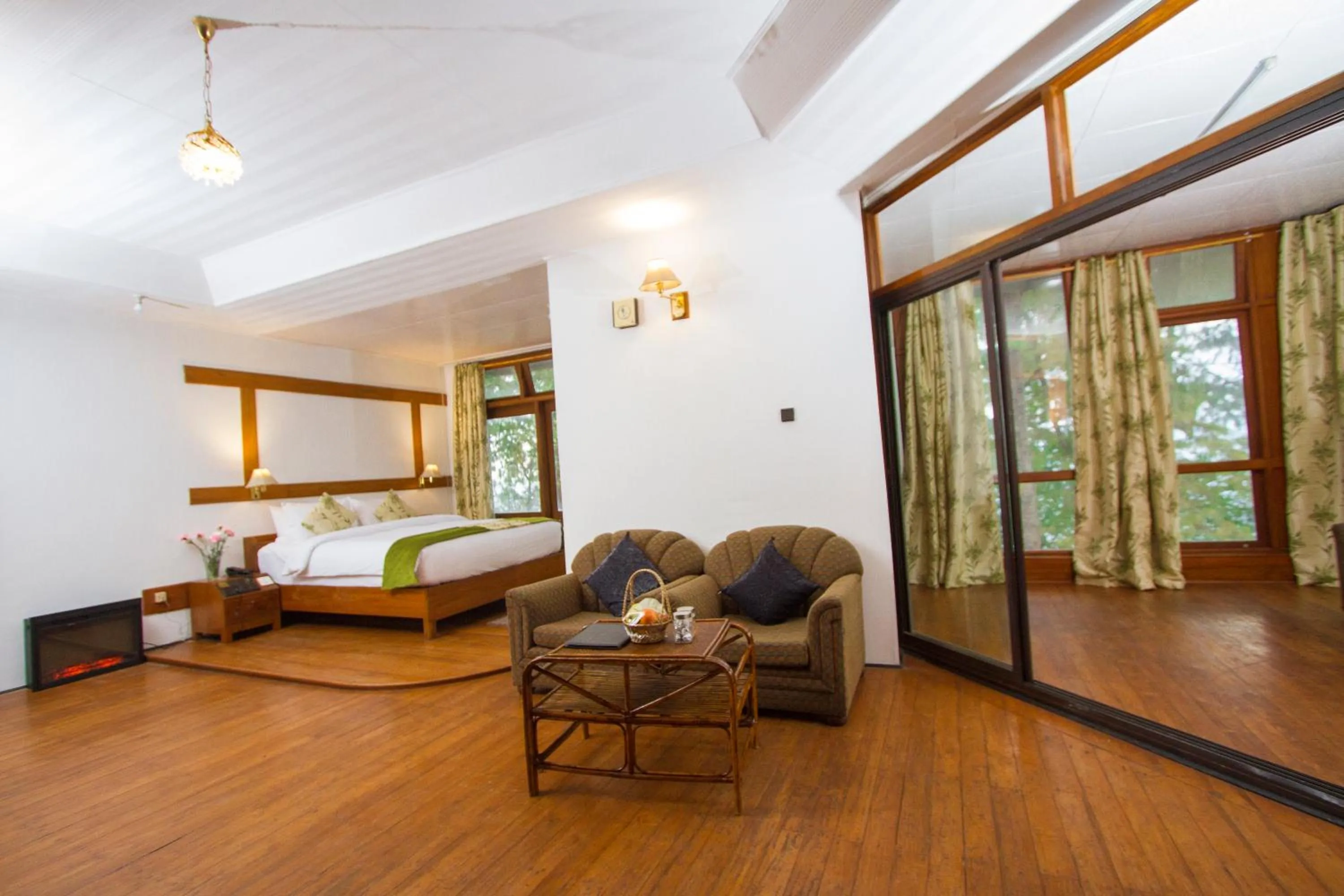 Living room, Bed in Niraamaya Retreats Aradura Kohima