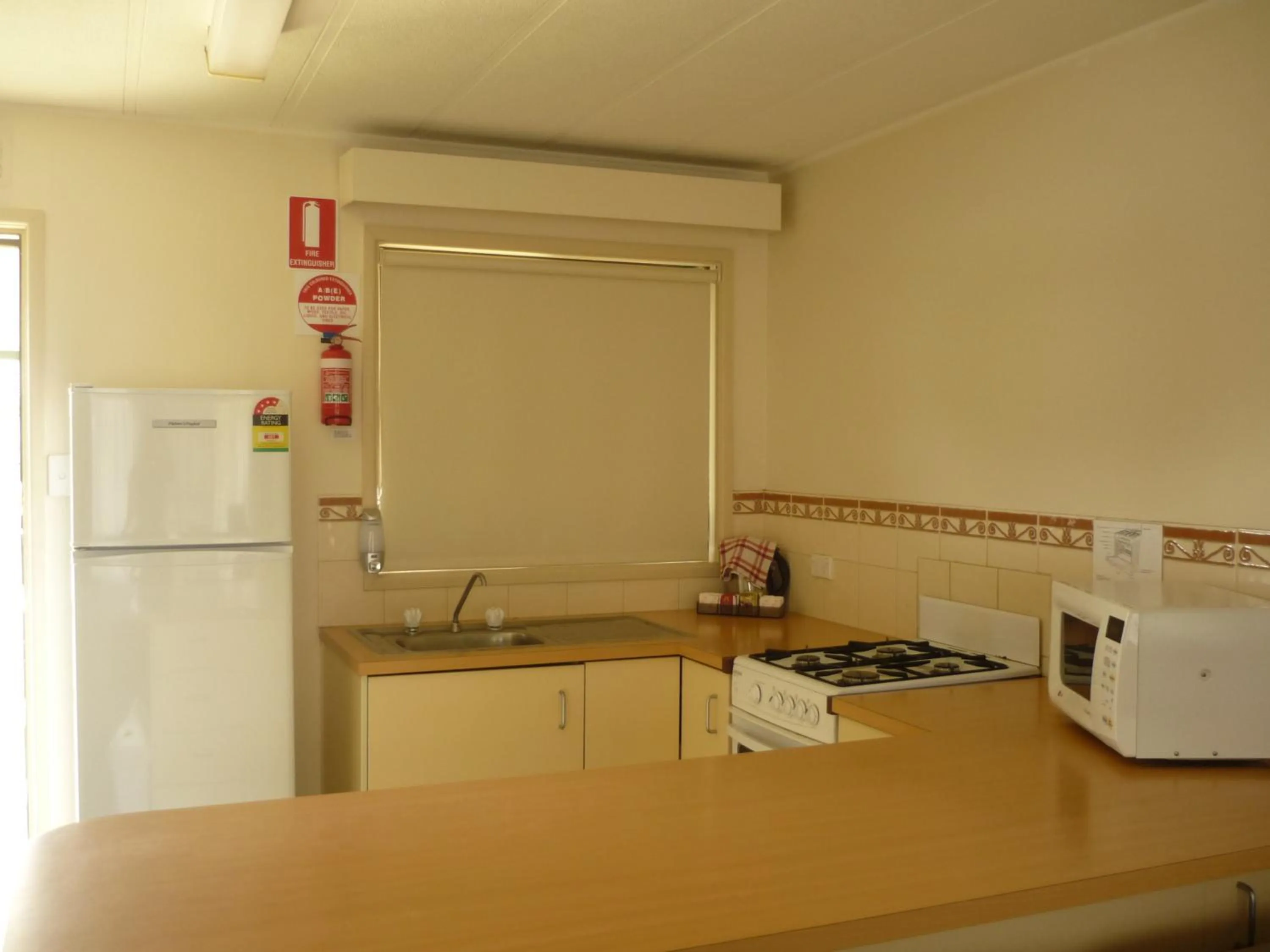 Kitchen or kitchenette in Wollongong Surf Leisure Resort