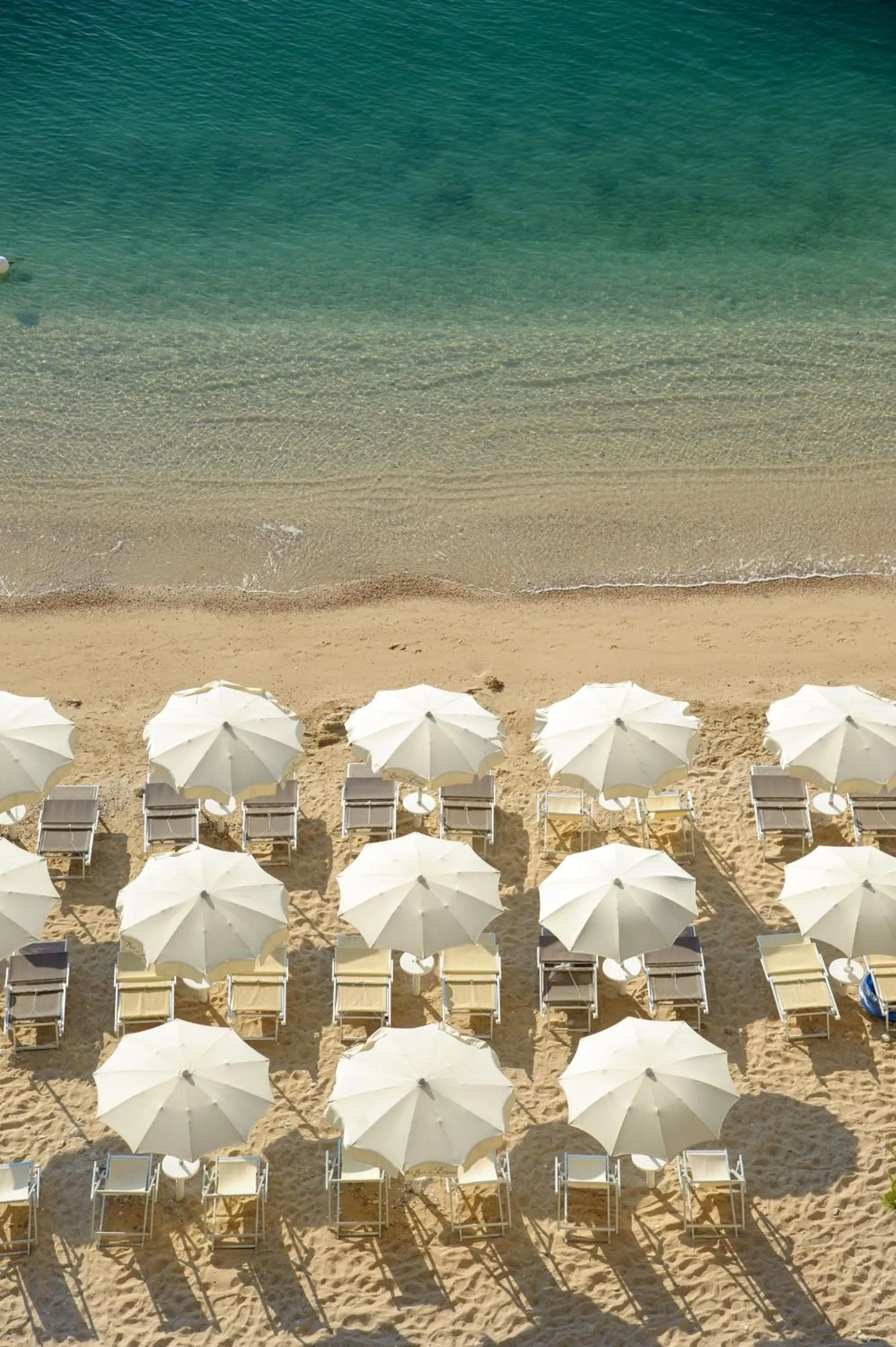 Swimming pool in Baia Delle Zagare - Handwritten Collection