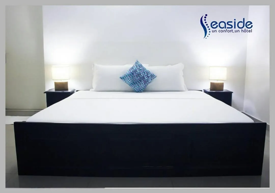Bed in Hôtel Seaside