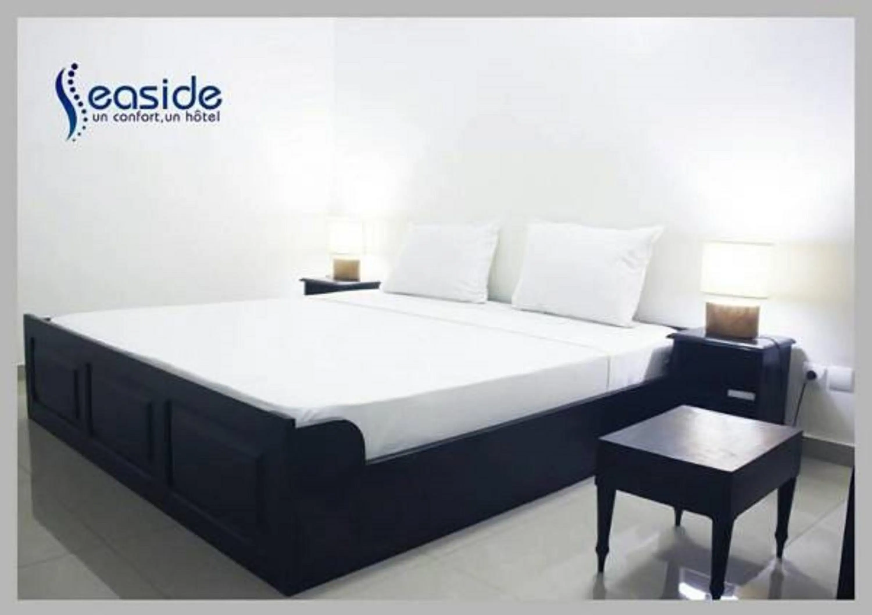 Bed in Hôtel Seaside