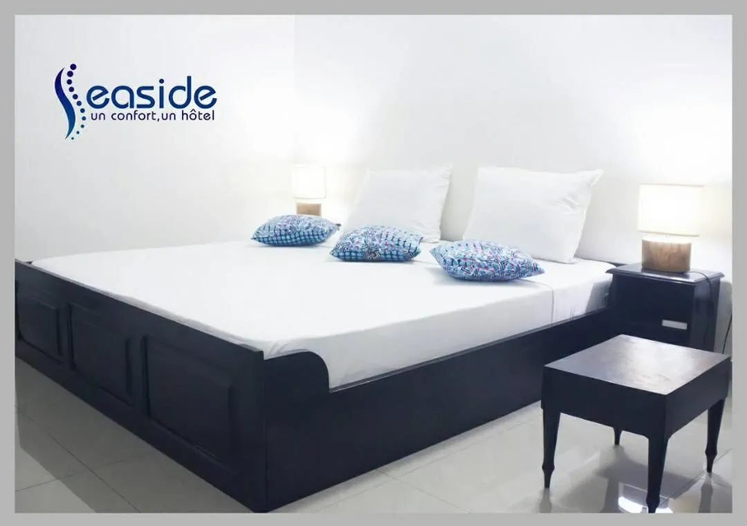 Bed in Hôtel Seaside