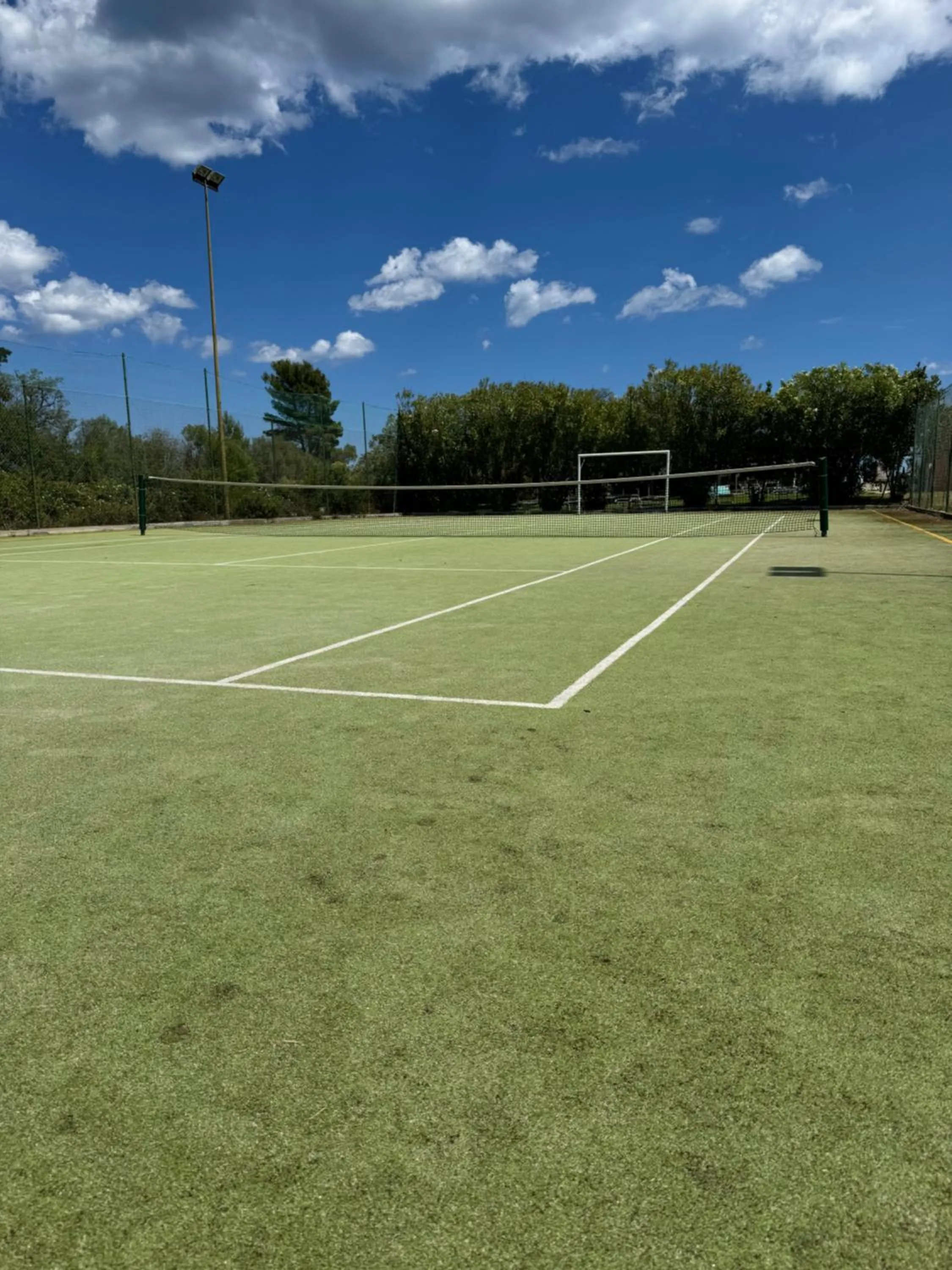 Tennis court in Li Suari Club Village