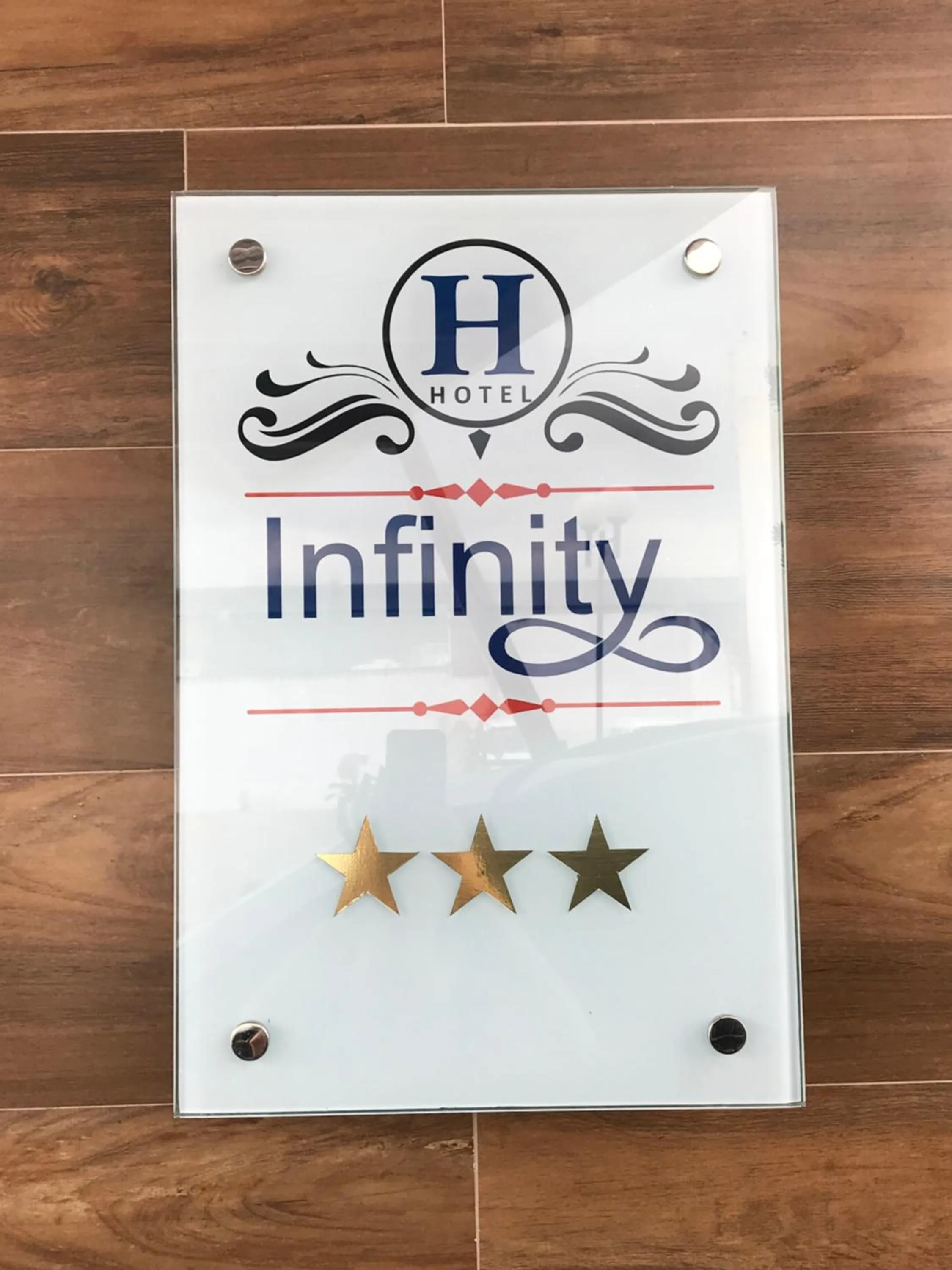 Property logo or sign in Hotel Infinity